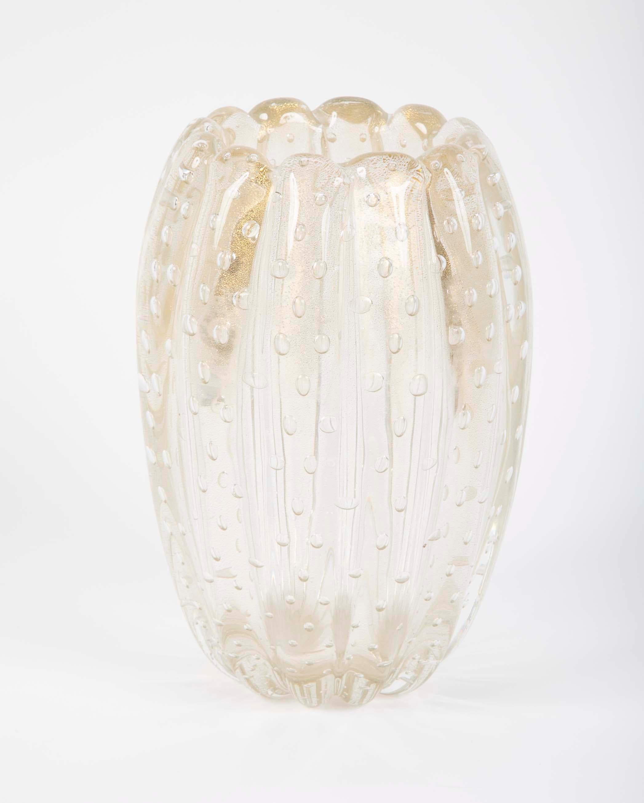 A large gold fluted glass vase with bubbles designed by Ercole Barovier for Barovier & Toso.