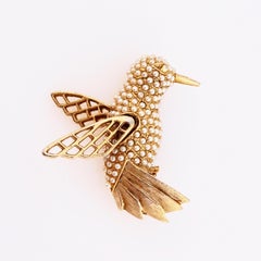 Gold Flying Hummingbird Figural Brooch With Seed Pearl Pavé By Hargo, 1950s