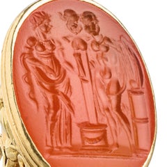 Gold fob seal with Renaissance intaglio of herm, figures, and altar with lyre.