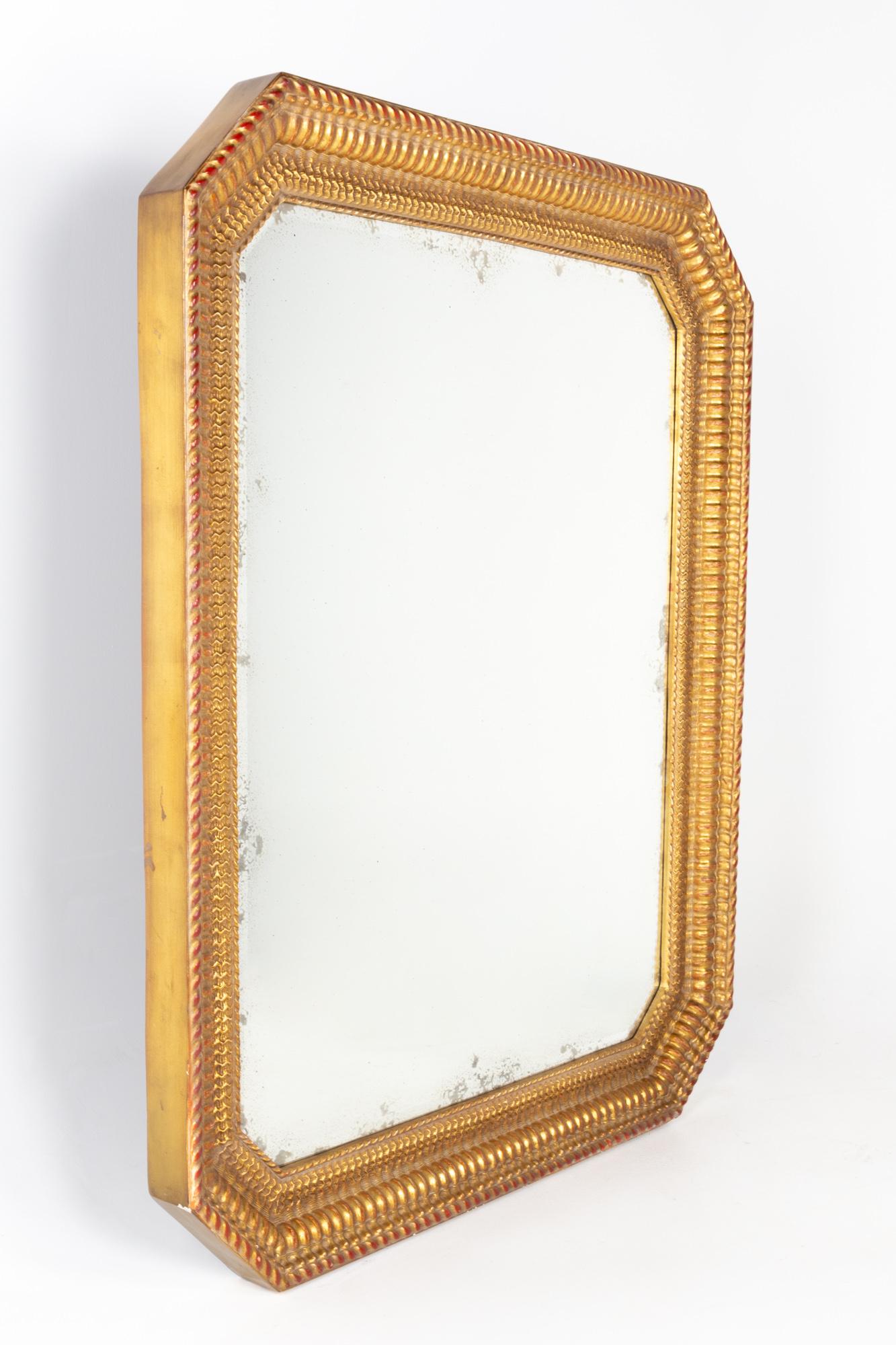 Gold framed antique mirror

This mirror measures: 42.5 wide x 3.5 deep x 52 inches high

This mirror is in excellent vintage condition with minor marks, dents, and wear.

About Photos: We take our photos in a controlled lighting studio to show as