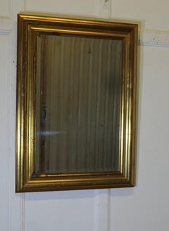 Gold Framed Wall Mirror  This is a good size and a very attractive piece