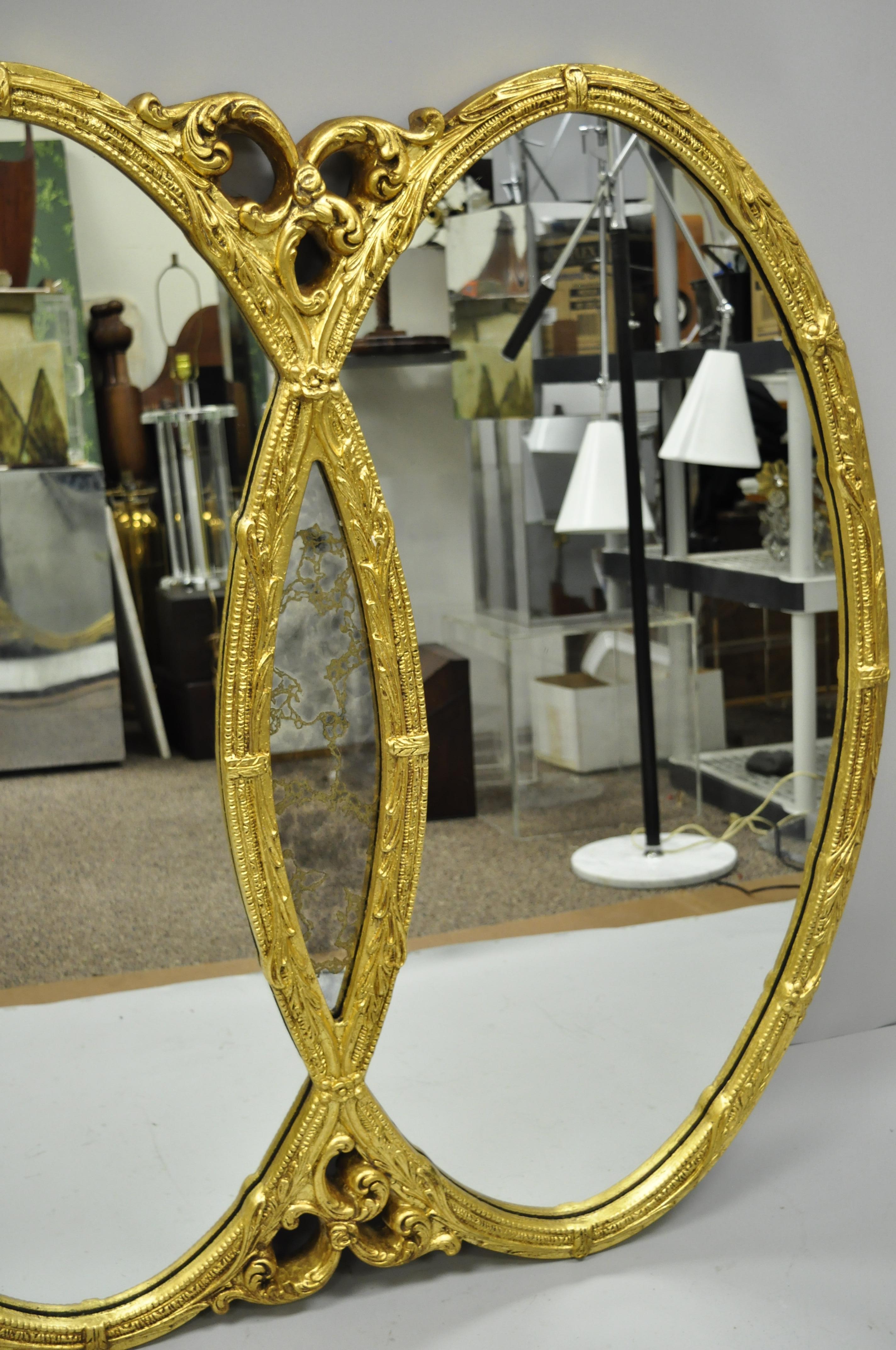 Mid-20th Century Gold French Hollywood Regency Triptych Triple Interlocking Oval Wall Mirror