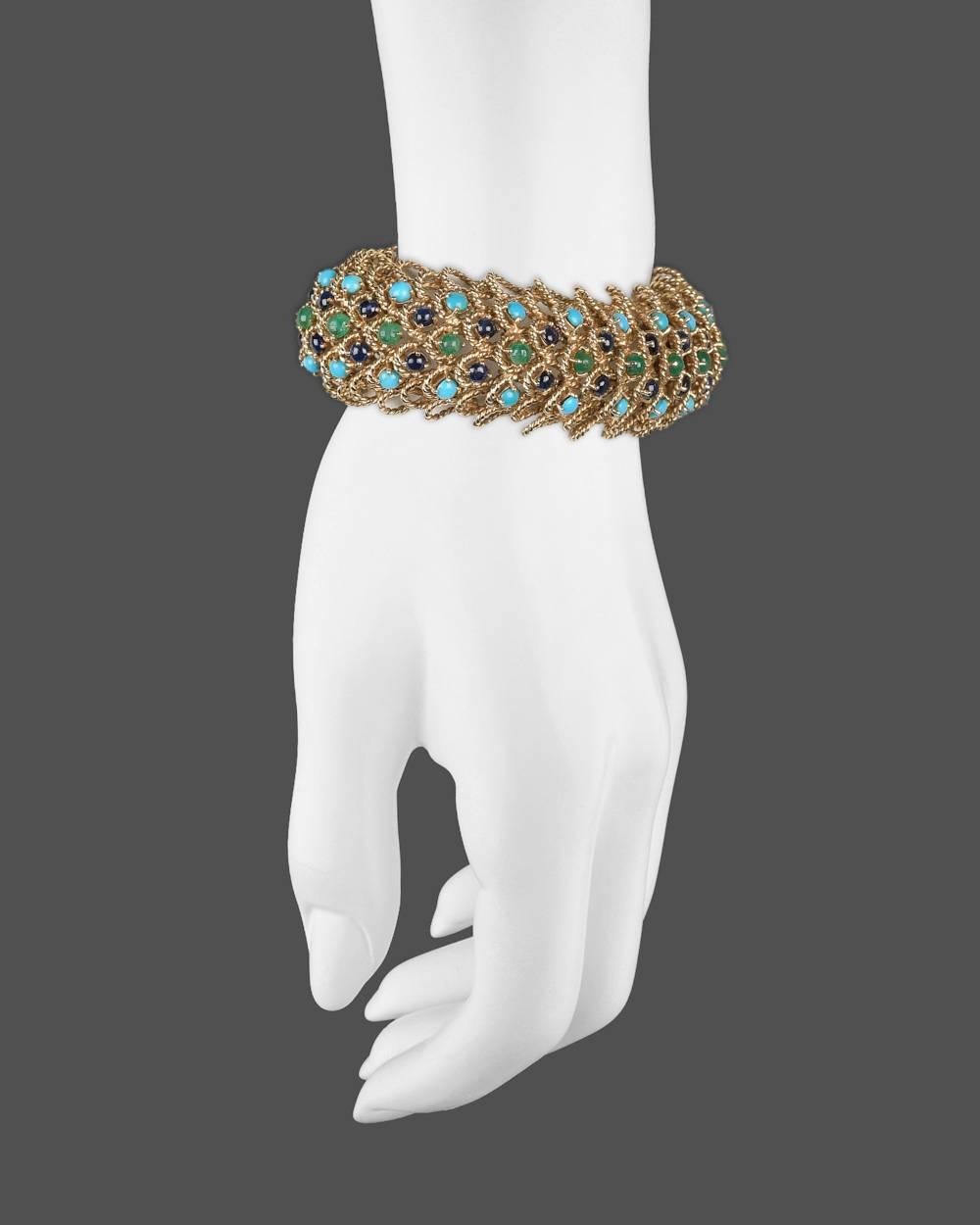 Woven openwork twistwire gold link bracelet, featuring round cabochon-cut turquoise, sapphire and emerald, in 18k yellow gold. 8.75