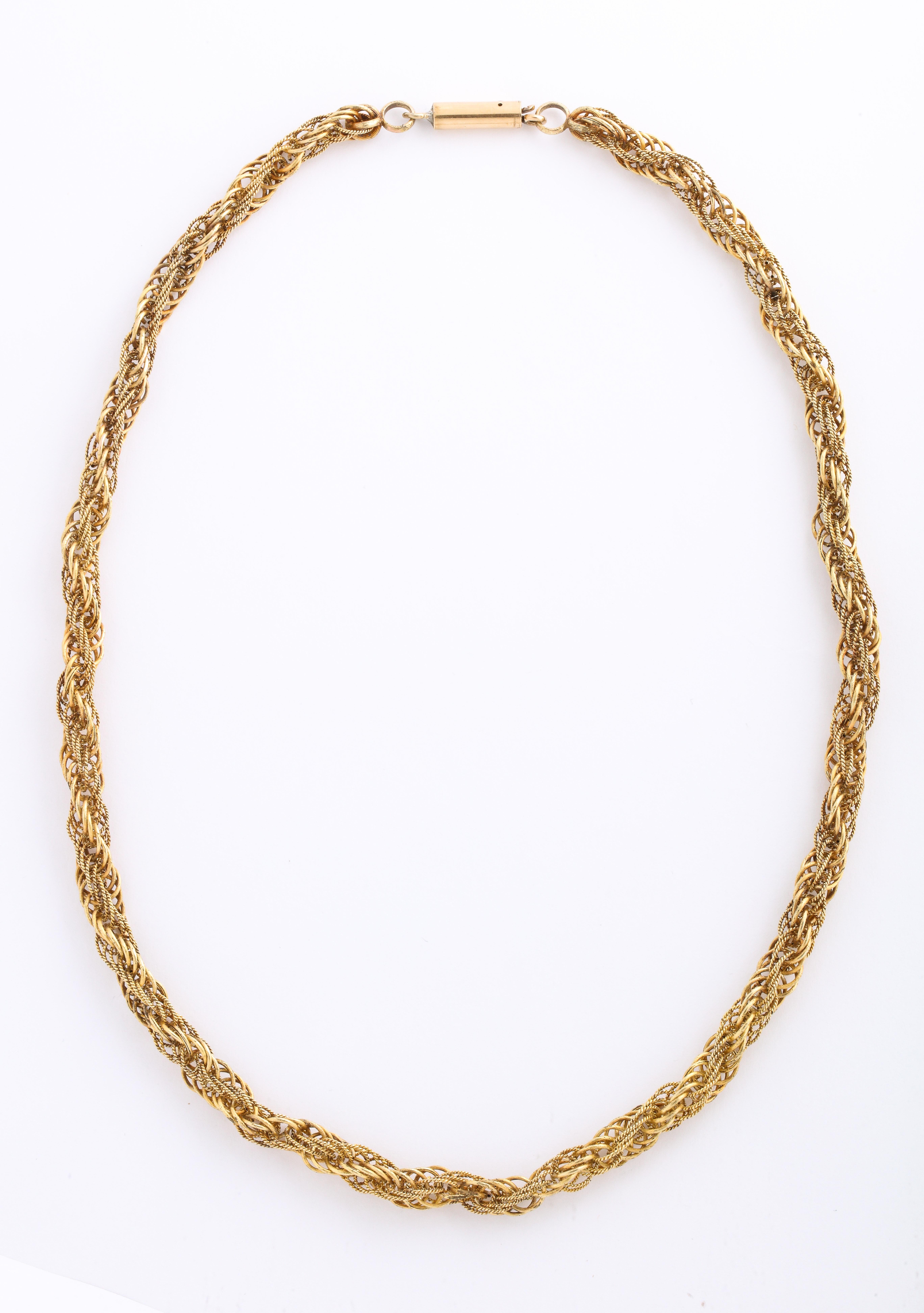 A twisted and braided 15 Kt rope chain from the Georgian period in a super wearable length and at good value. With the price of gold so high, one would expect the price to be $4000.. Bargains are dinosaurs. 
The chain can be worn inside a shirt