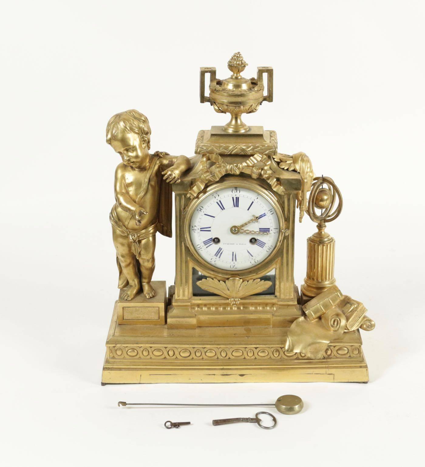 Gold gilt bronze clock from the 18th century. Movement replaced in the 19th century, by Le Roy of Paris.
Measures: H 45cm, L 37cm, P 16cm.
 