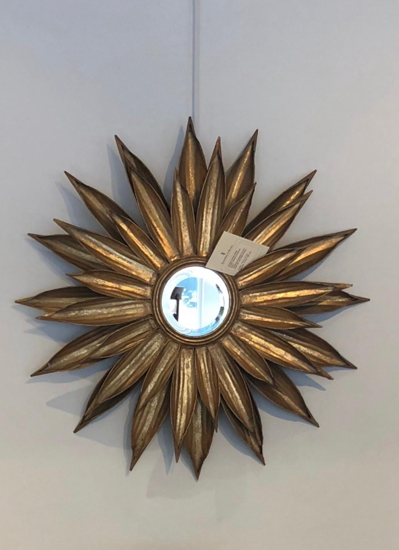 Gold gilt French sunburst / sunflower flower mirror

natural form leaf gilt, patinated.