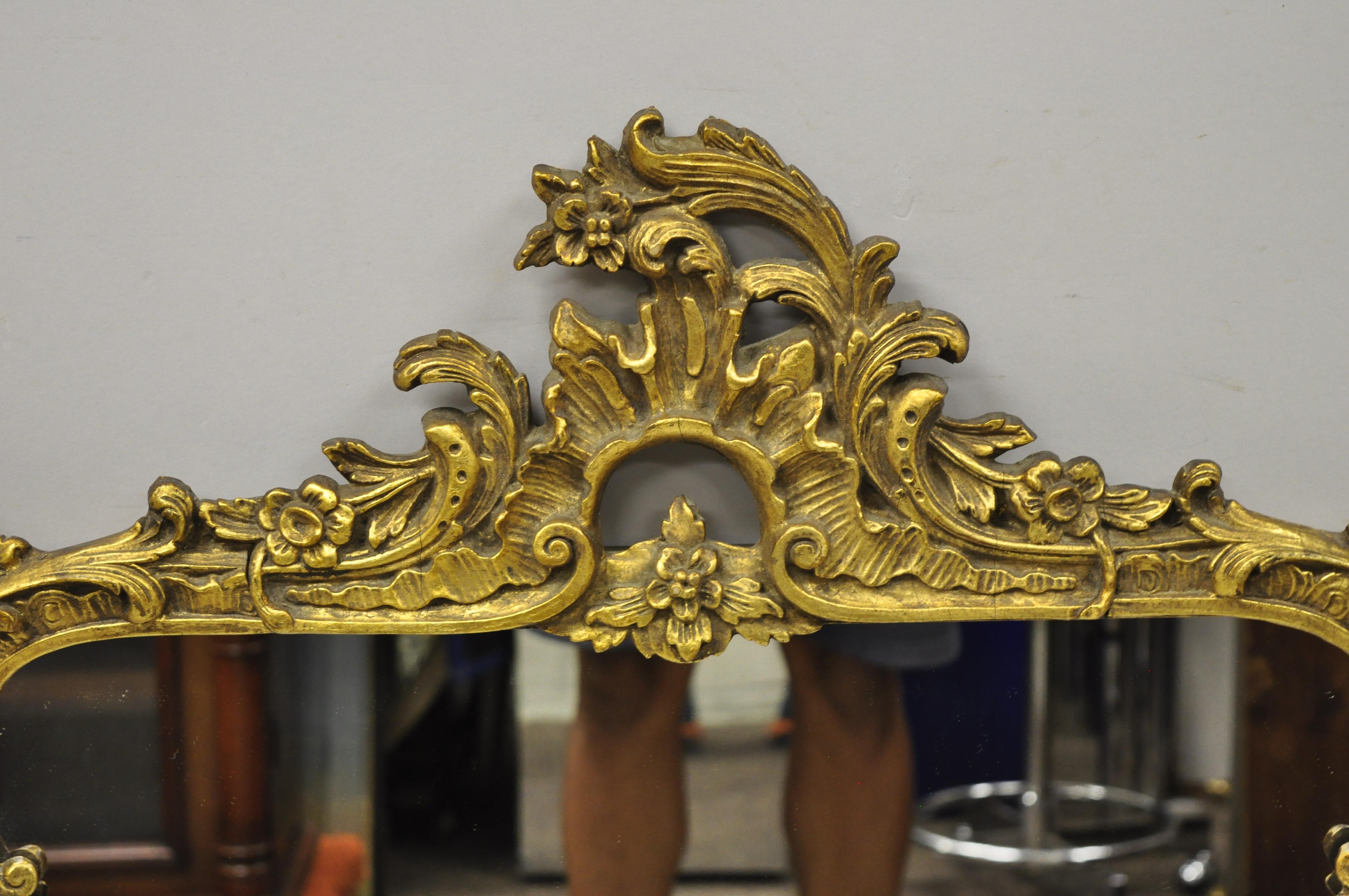 Gold gilt gesso 45 x 28 French Rococo acanthus leafy console wall mirror. Item features an ornate gold gilt gesso frame, acanthus leafy design, very nice antique item, great style and form, circa early to mid-20th century. Measurements: 44.5