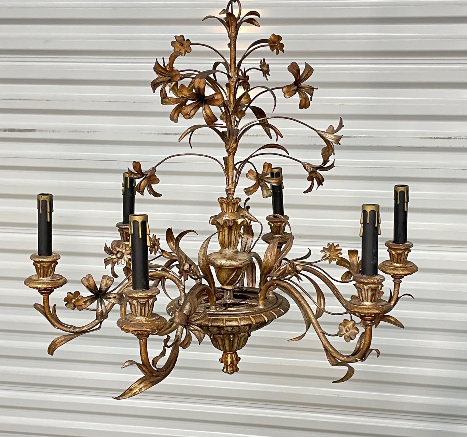 Beautiful Italian tole floral six-light chandelier in gold gilt. Made in Italy hang tag still present.  Good vintage condition with minor imperfections consistent with age.
For a shipping quote to your exact zip code, please message us.
