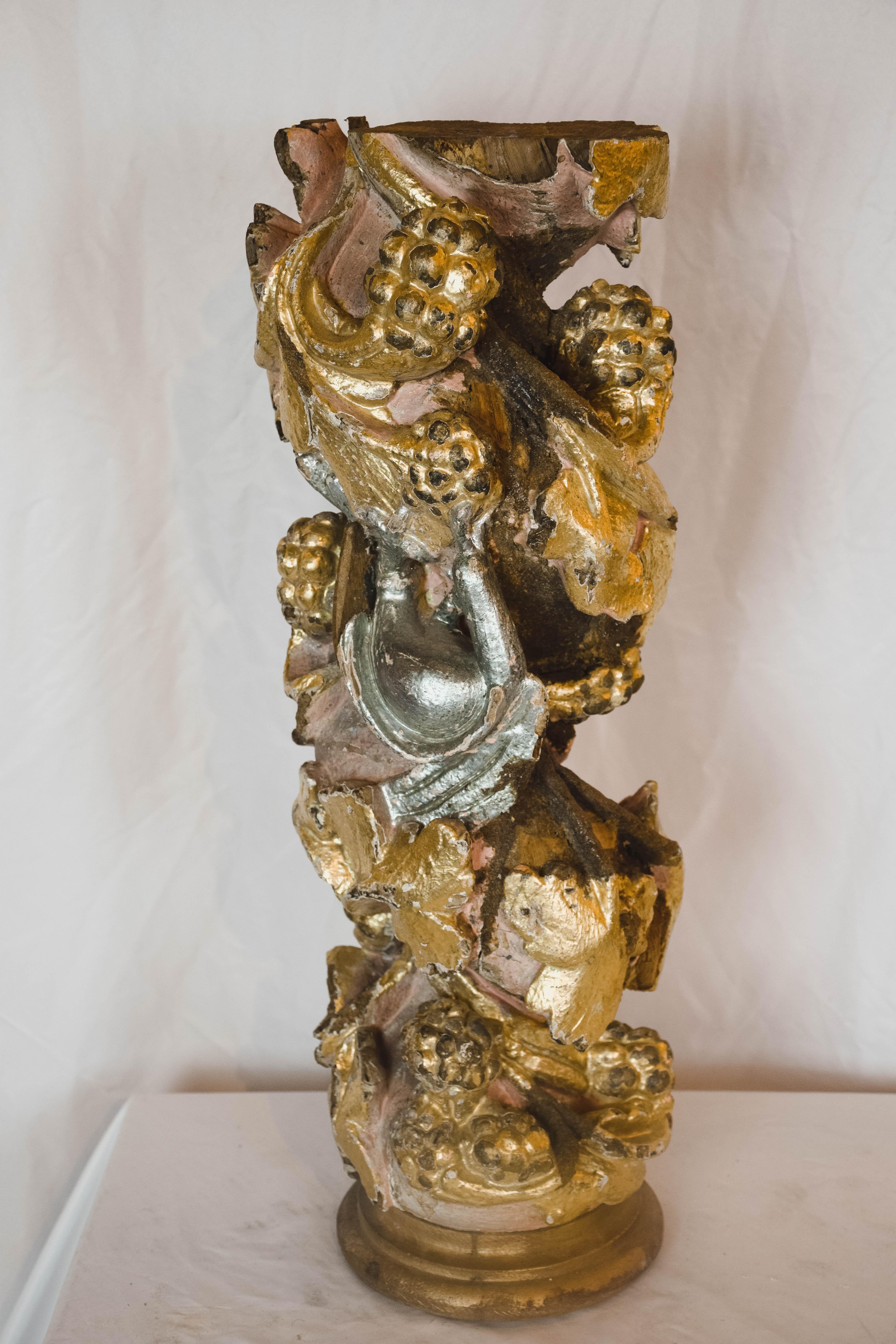 This gold gilt Portuguese architectural element has some hints of a pink patina as well. We have it hanging in our showroom but could also be propped up in a standing position. Most likely from a church decoration. Would make a statement in any