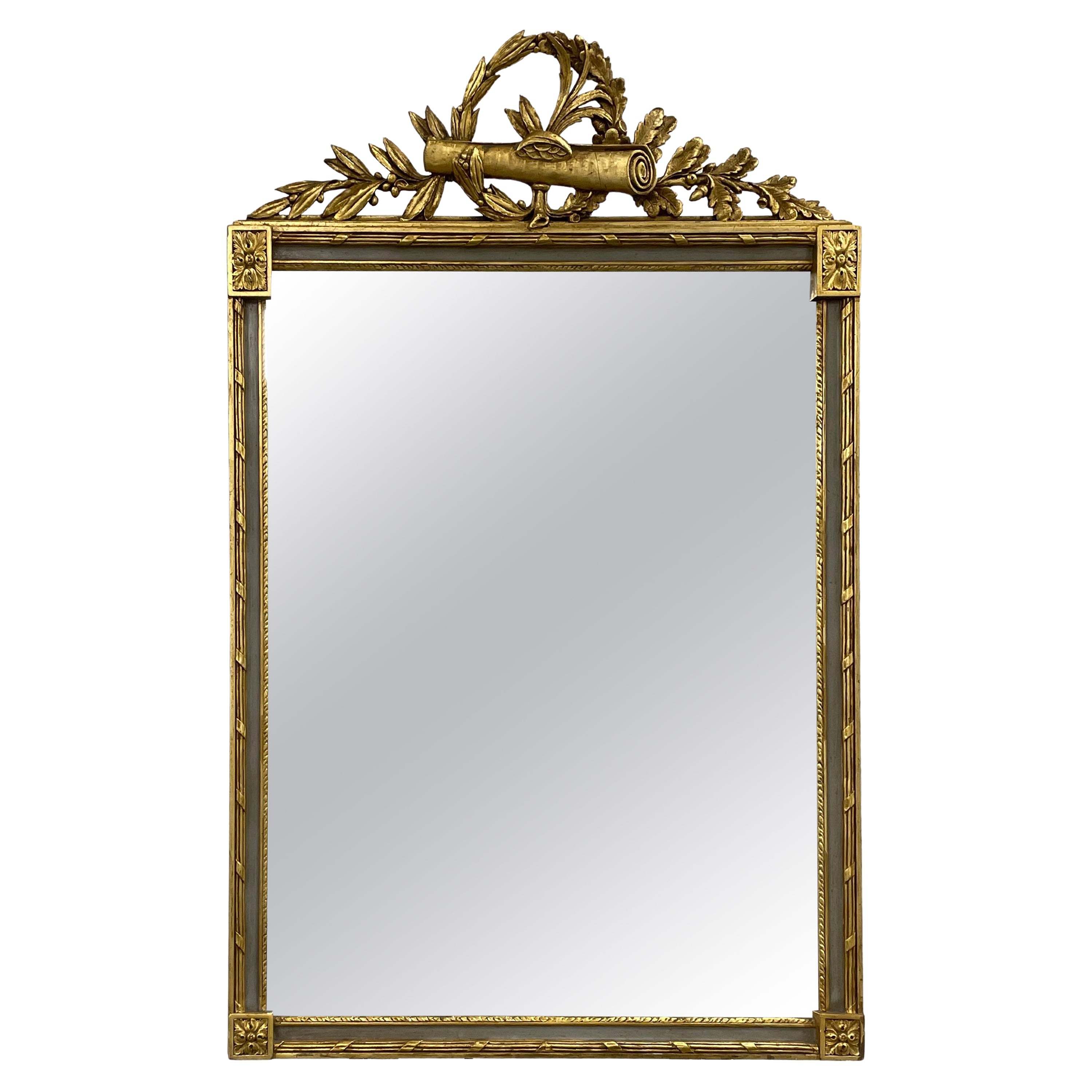 Miroir à volutes doré à l'or