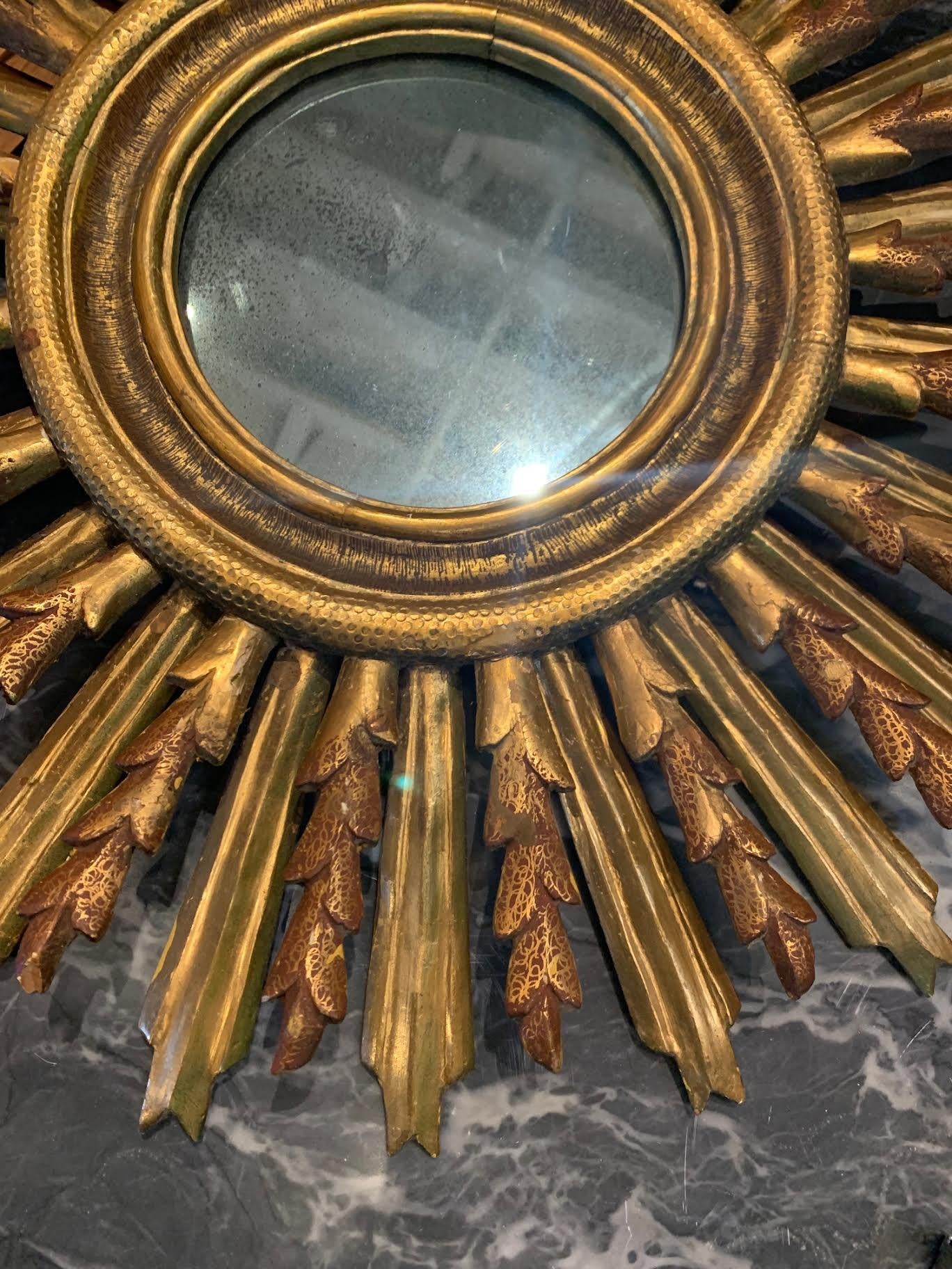 1920's Spanish gold gilt wooden frame in starburst design.
Double spoke design.
Beautiful natural patina.
Three different starburst designs available.