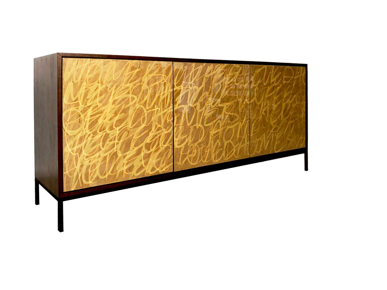 Our gold Graffiti cabinet is designed and finished in our Toronto Studio, Morgan Clayhall.
The cabinet doors have original art work by artist Murray Duncan. The client can supply words/poems/names/birthdays, etc that can be incorporated into the