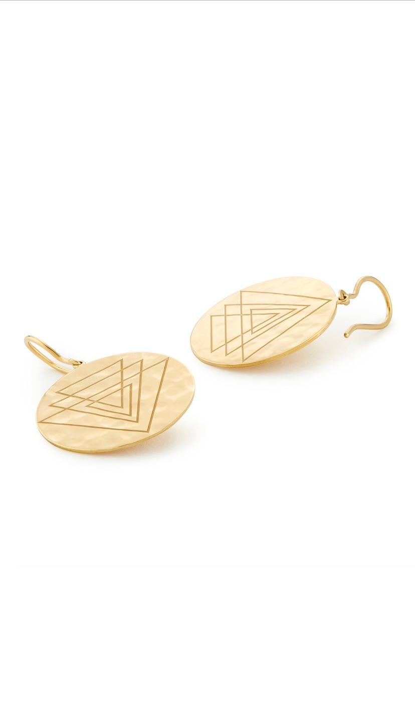 These Engraved 18 Karat solid gold Earrings are hand-made in Los Angeles, CA and they are called 'Creation Earrings'. They are hammered to reflect light and they have gentle movement. They have 2 engravings with upward and downward facing triangles