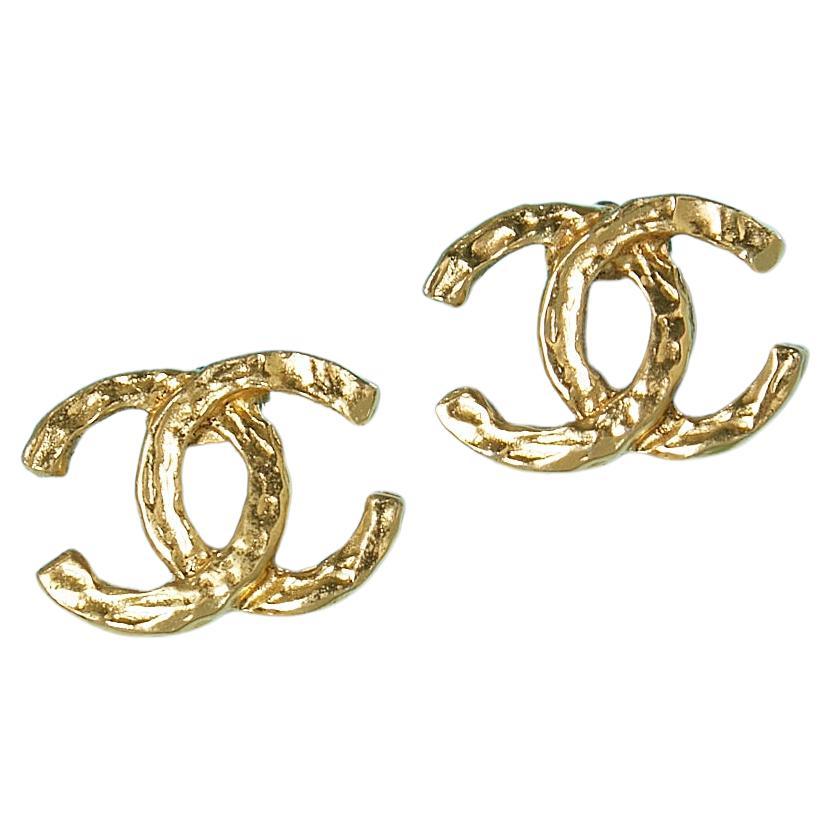 Gold hammered metal "CC" clip-on earrings Chanel Circa 1980's 
