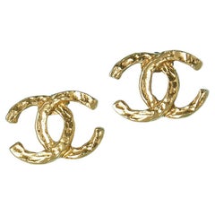 Vintage Gold hammered metal "CC" clip-on earrings Chanel Circa 1980's 