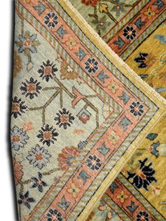 Gold Handknotted Rug with Blue Border, Pink, Green, and Floral Motifs, 6' x 9'