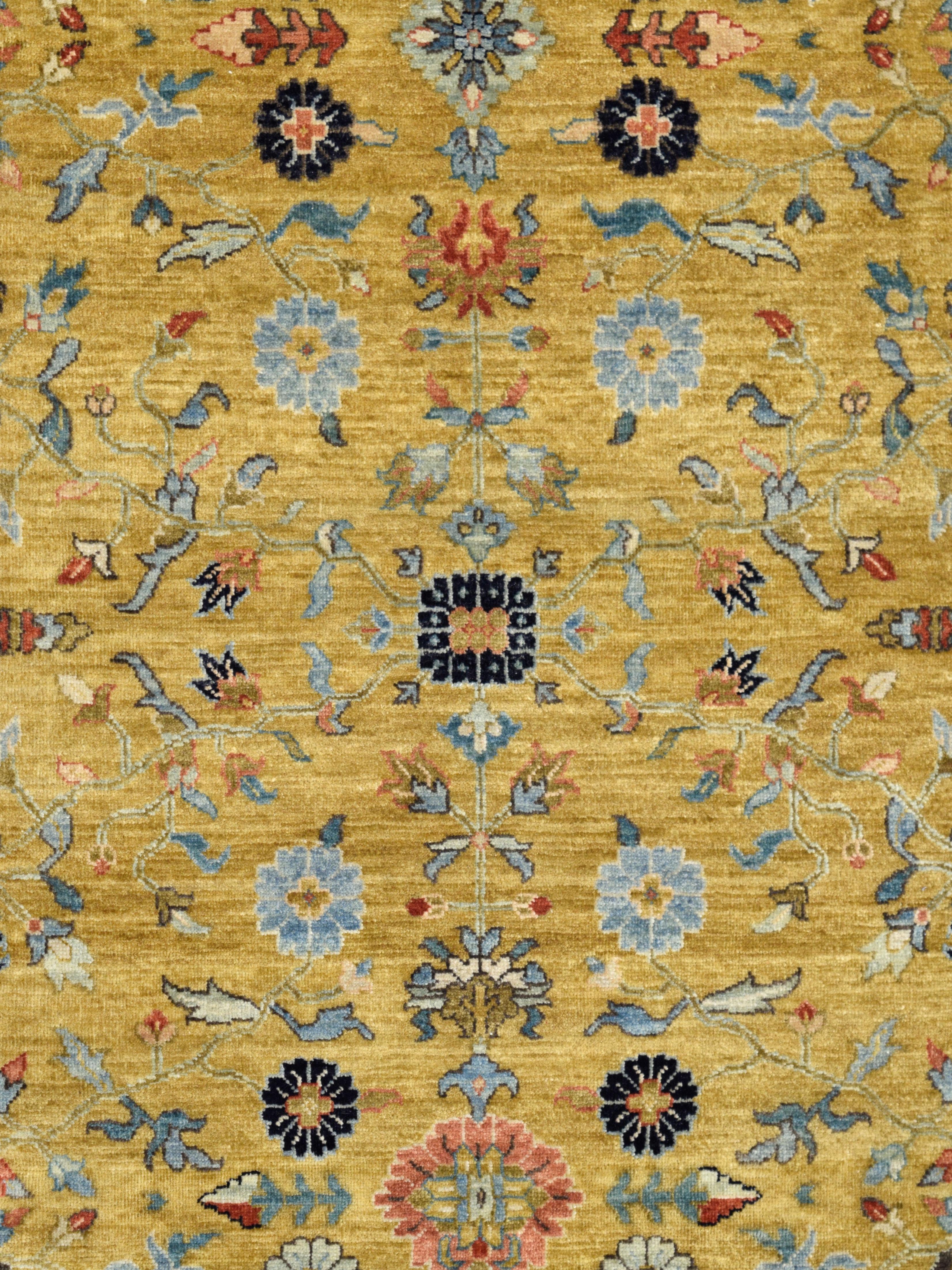 Wool Gold Handknotted Rug with Blue Border, Pink, Green, and Floral Motifs, 6' x 9' For Sale