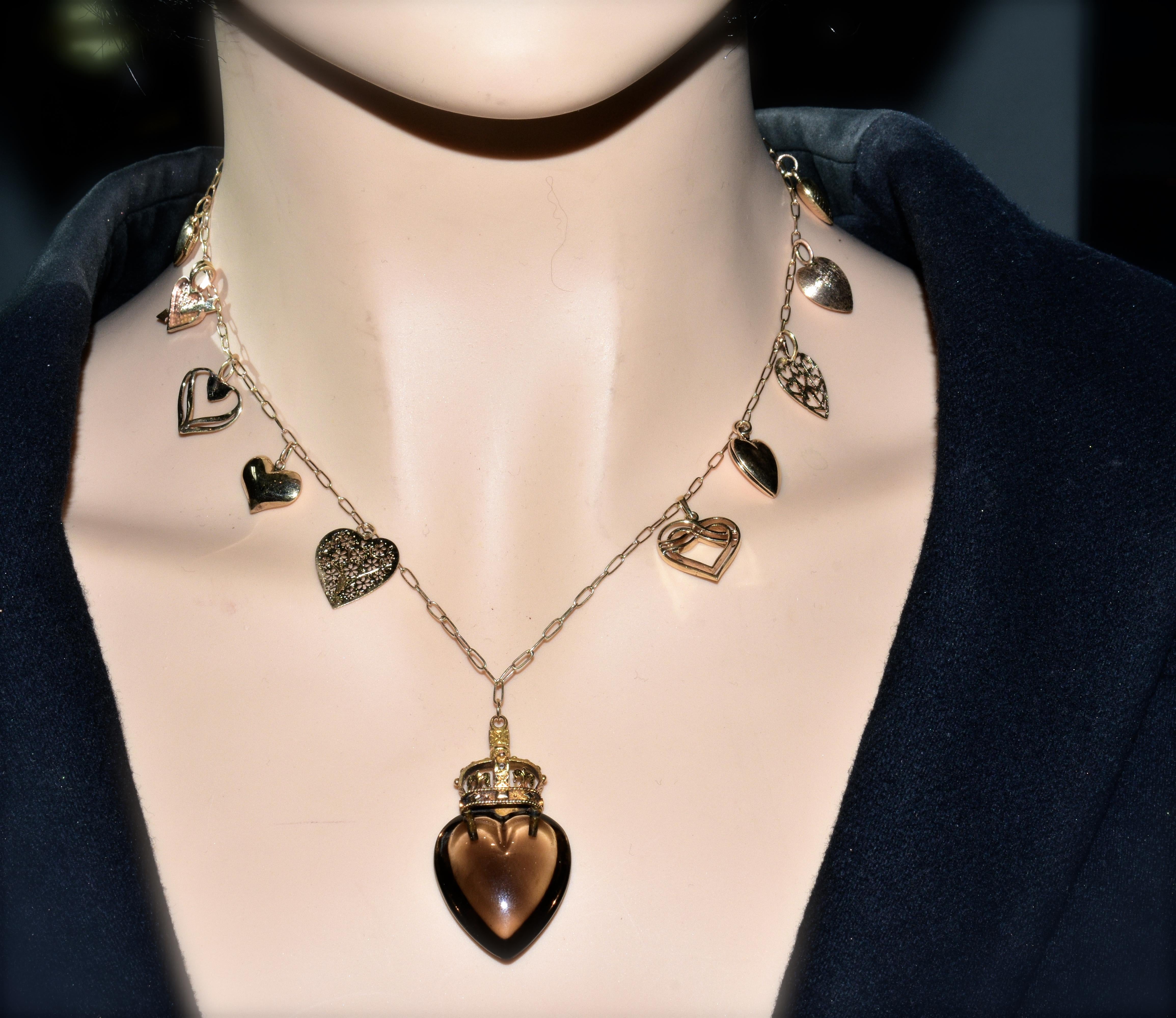 Gold Heart Motif Charm Necklace 1