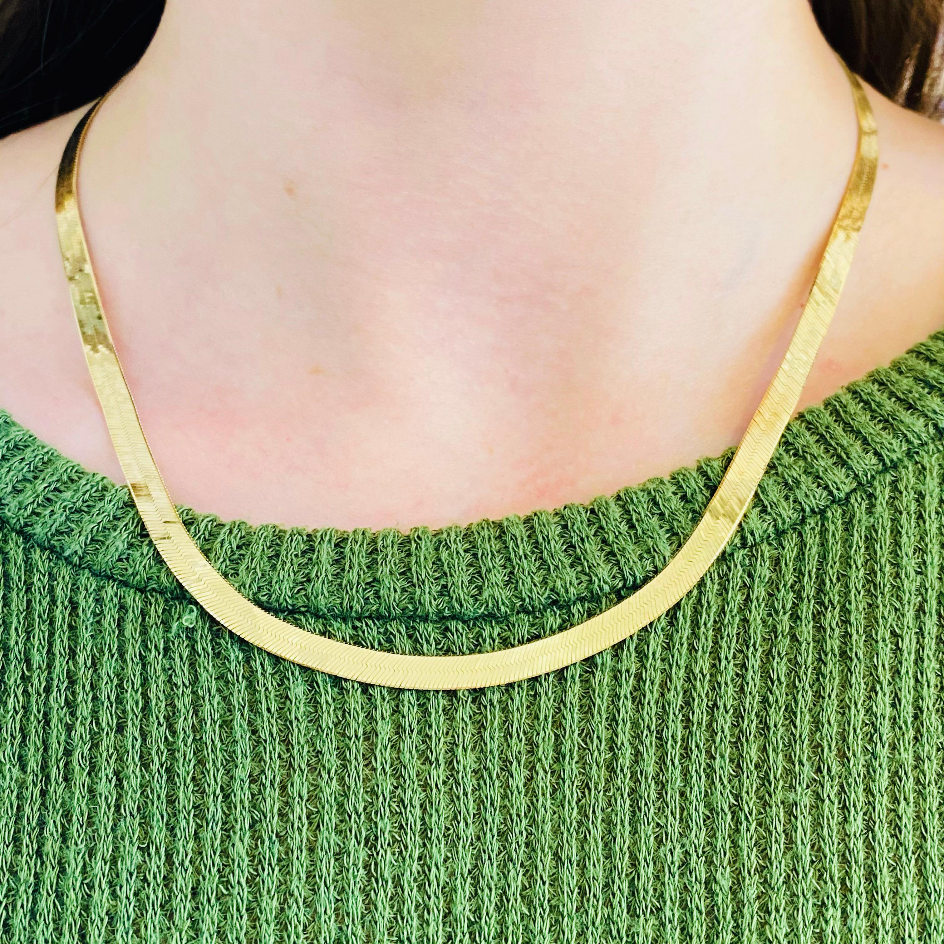 The herringbone chain, or flat gold chain style, which dates back to ancient Egyptian times, is a sophisticated design. It gets its name from the herringbone fish, a fish  known for their many parallel and slanted bones and this herringbone chain is