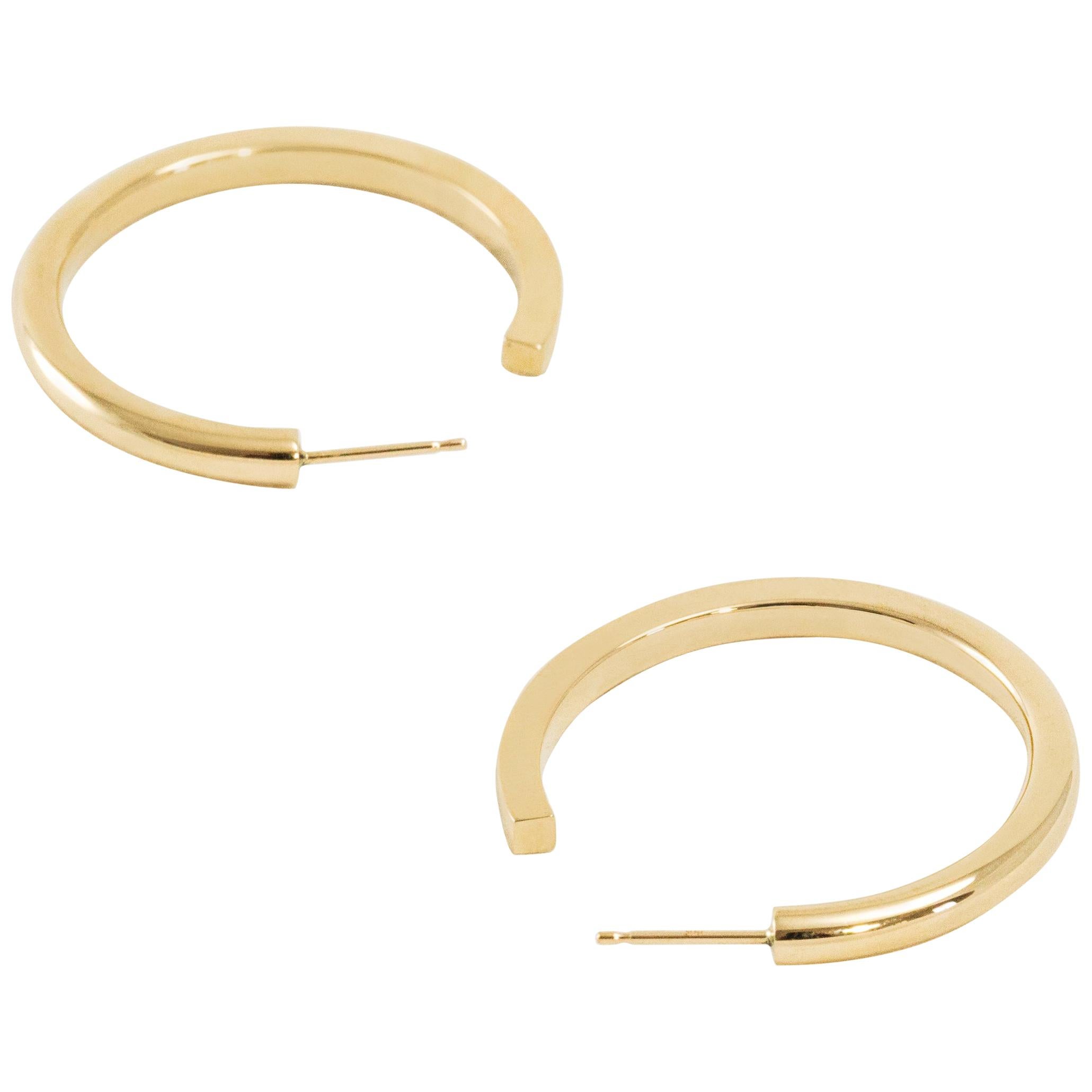 14k Gold: Flow Large Hoop Earrings Transitioning from Circle to Square For Sale