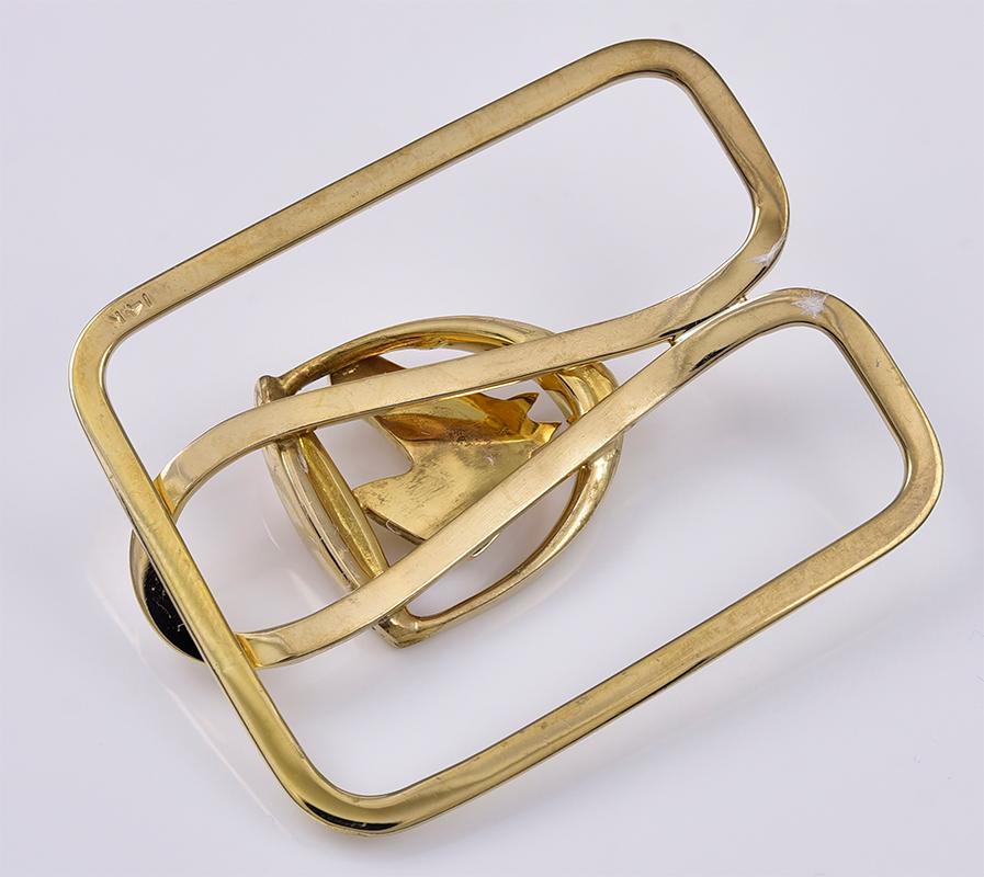 Gold money clip, with a figural 