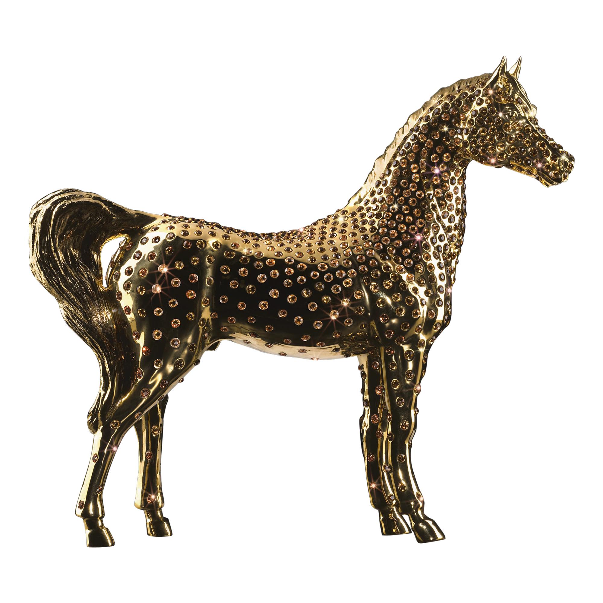 Sculpture de cheval en or avec cristaux ambrés