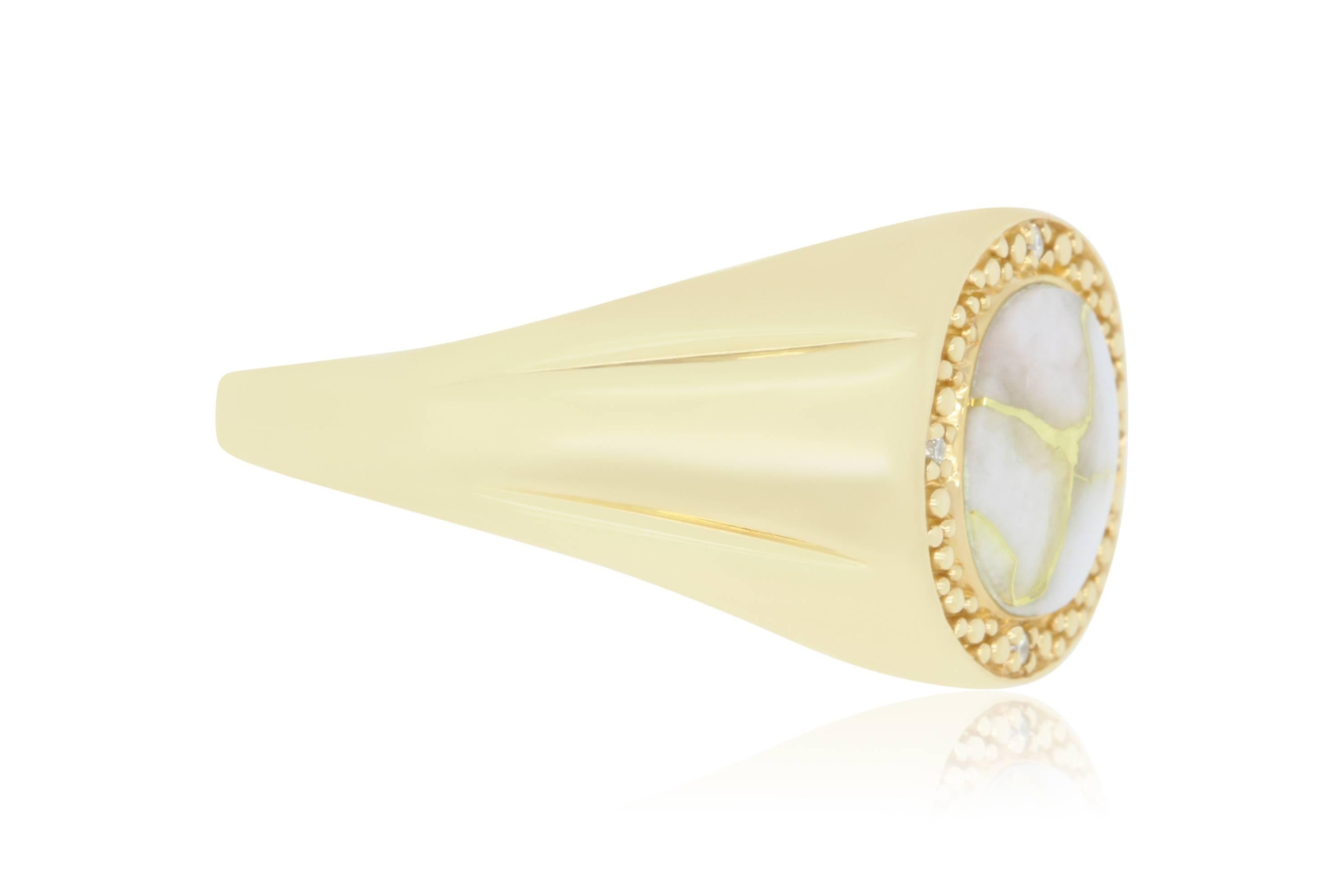 This unique Gold in Quartz stone weighs in at 3.55 carats. Set in a 14k Yellow Gold with 4 white diamonds, it is a guaranteed show stopper!

Material: 14k Yellow Gold
Gemstones: 1 Oval Gold in Quartz at 3.55 Carats.
Diamonds: 4 Brilliant Round White