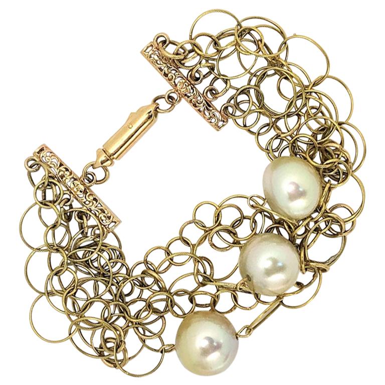Gold Interlocking Wire Link Bracelet with Pearls For Sale at 1stDibs