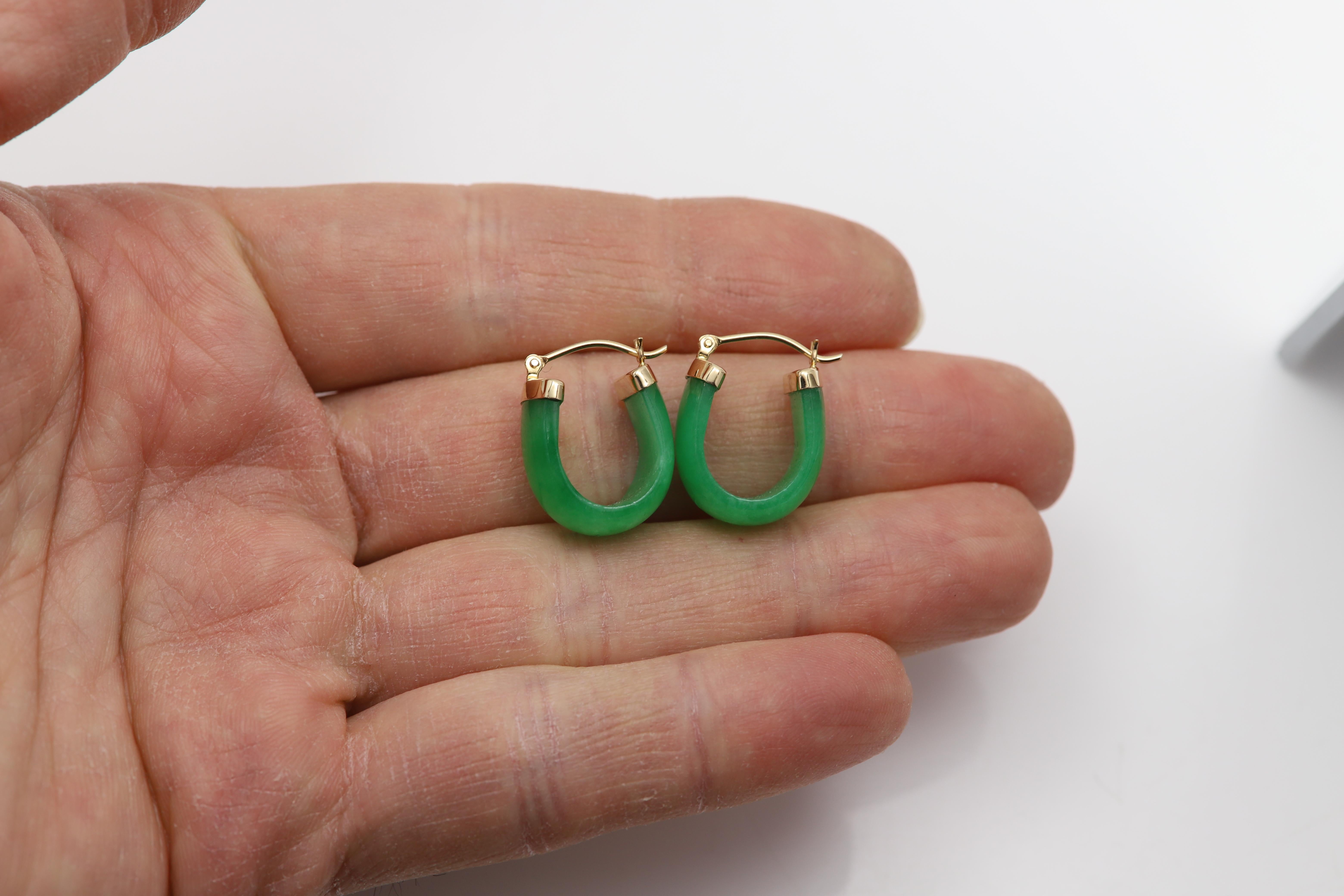 Beautiful Jade Huggie Earrings
14k Yellow Gold 
Earring weight 6.70 grams.
Size: approx  10 mm wide (0.30' inch)
16mm high (0.75' inch)
Lever back closure
Gift Box Included
#nob1915991
