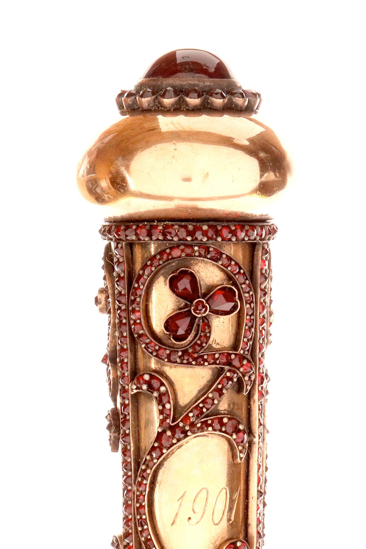20ième siècle Bâton de marche en or avec pierre en grenat. Par Antoine Bricteux, France 1901. en vente