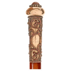 Gold jewel walking stick with garnet stone. By Antoine Bricteux, France 1901.