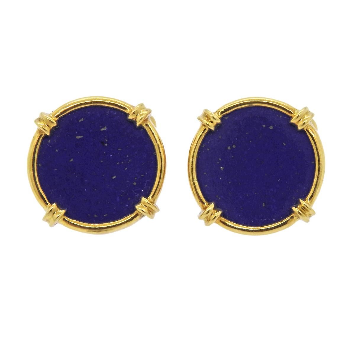 Pair of 18k gold lapis cufflinks. Cufflink tops measure 20mm in diameter and weigh 14.9 grams. Marked 750. 