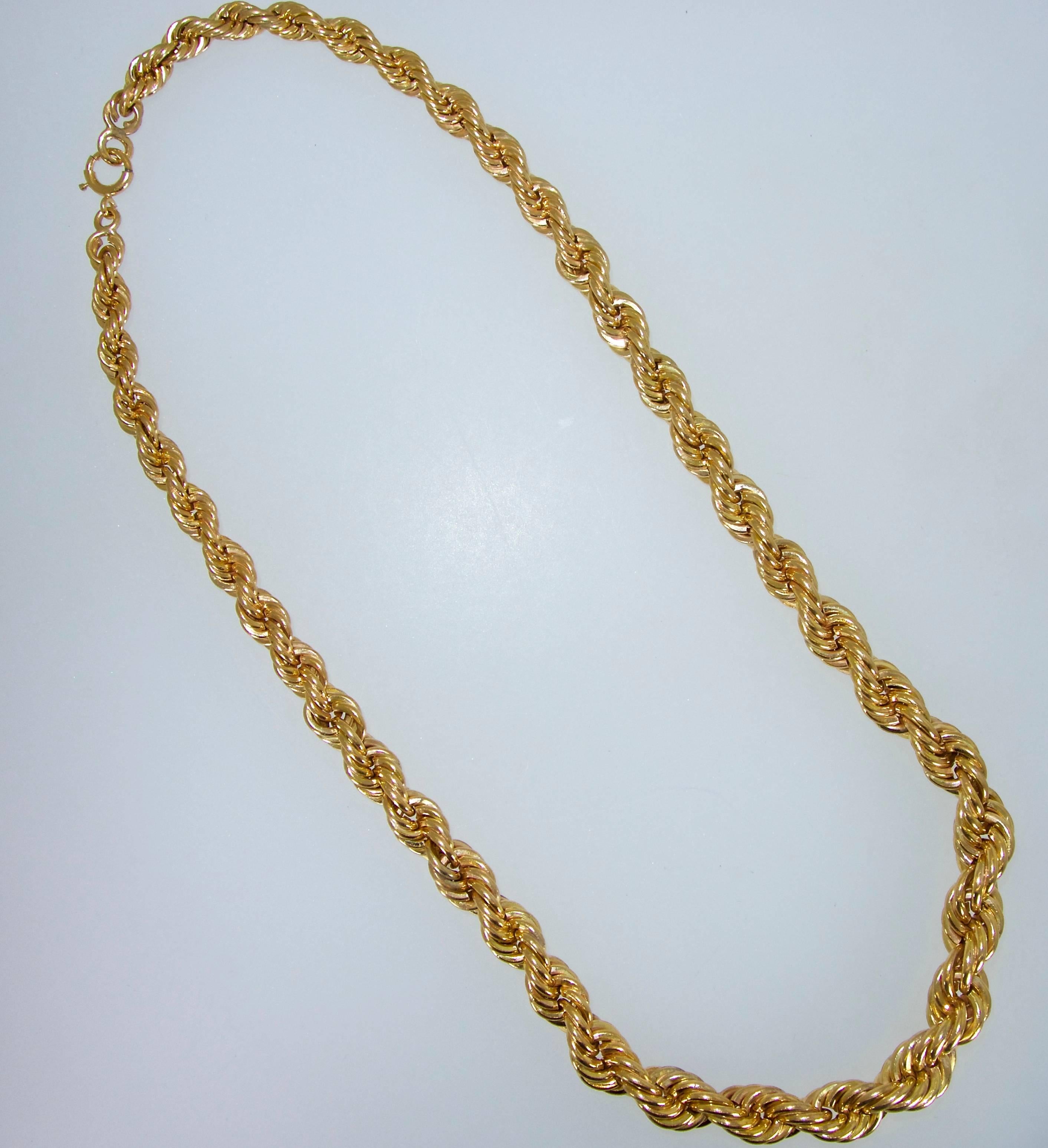 14k with a unusual large twisted link design, 69.5 grams, 16 inches in length with a spring and jump ring clasp.