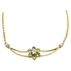 Gold Lavaliere Pendant Necklace with Three Diamonds and Six Peridots