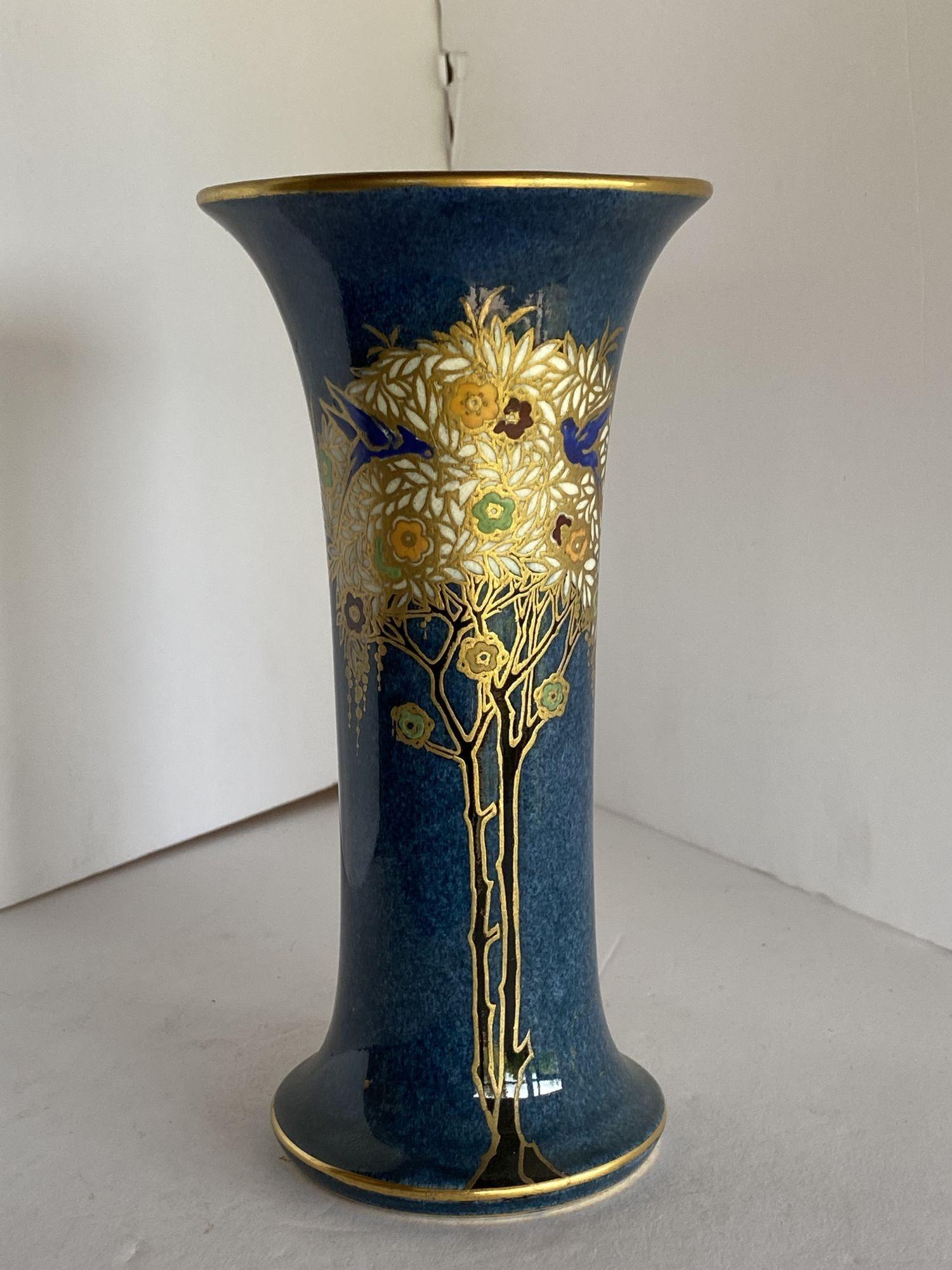 A Royal Worcester vase with a hand-painted gold leaf floral in an almost Gustav Klimt style.
 
Signed Shape G923 Date code 1890.