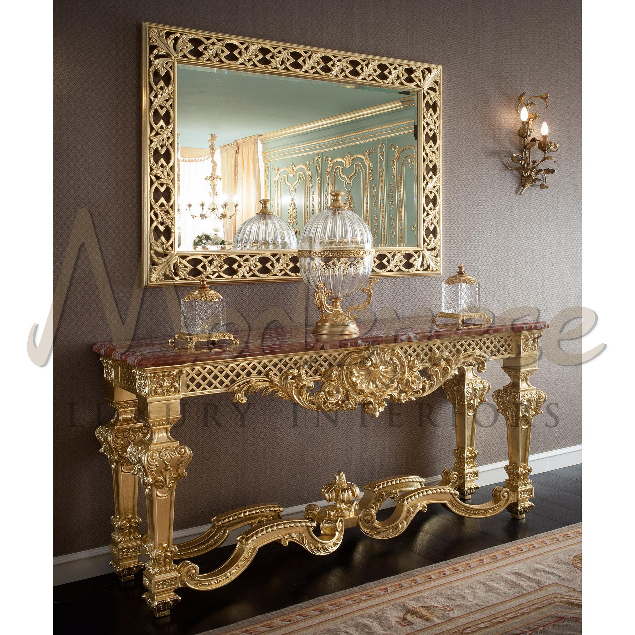 Turn your private villa in a wonders museum with this unique Modenese Interiors gold leaf baroque console. The selected item goes with a full 24kt gold leaf finishing and handmade carvings. Its structure has been purposely designed to reflect shiny