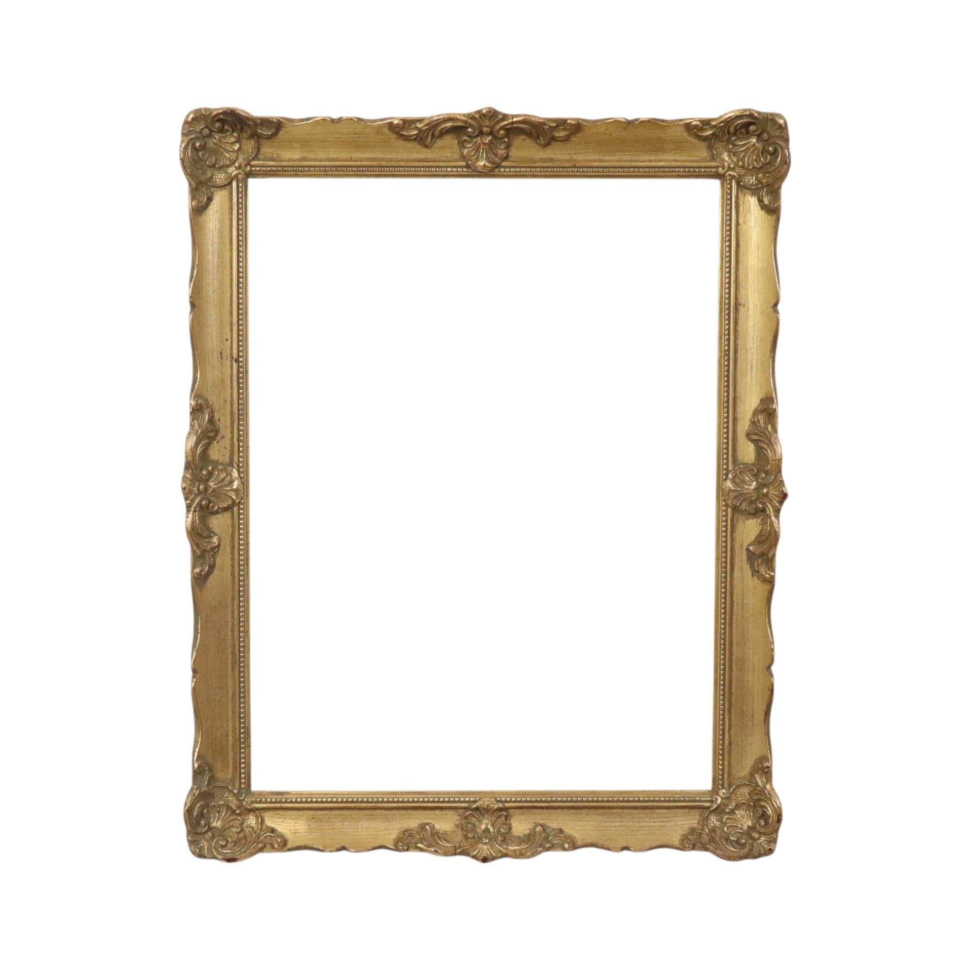 Beautiful, gold-leafed classic frame, entirely in the typical Baroque style, decorated with acanthus leaves, vines, flowers, and a striped pattern all around. Made of pine and plaster, circa the first half of the 20th century.

This fantastic