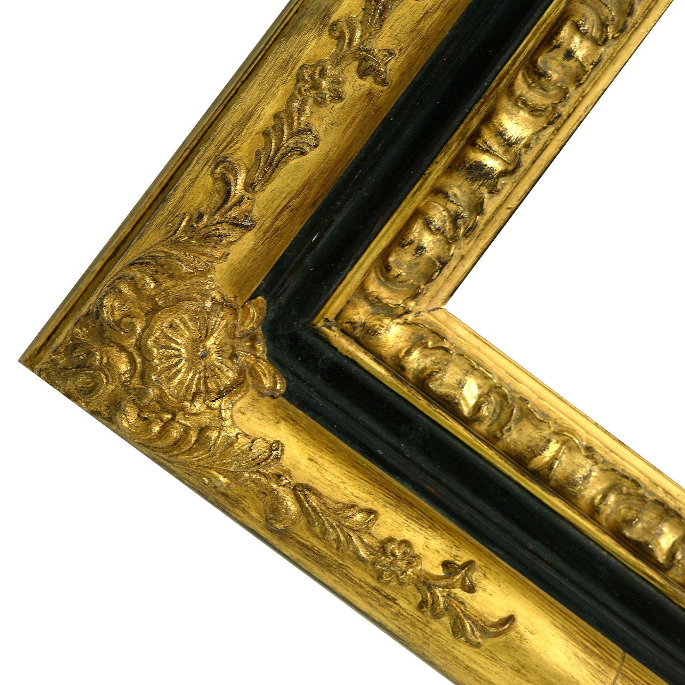 Exuding a sophisticated, dramatic flair, this wall mirror is a deft showcase of craftsmanship and of refined materials. Handmade of wood lacquered in a spectacular ebony shade, its richly detailed yet simple, rectangular frame is decorated with
