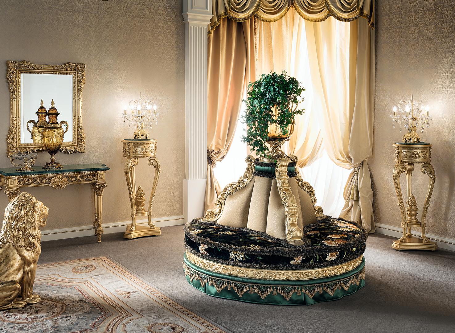 Astonishing Made in Italy console fully decorated with gold leaf finish and a Guatemala green marble top. The precious hand-made carvings, which Modenese artisans developed through centuries, make this item eligible for royal palaces and elegant