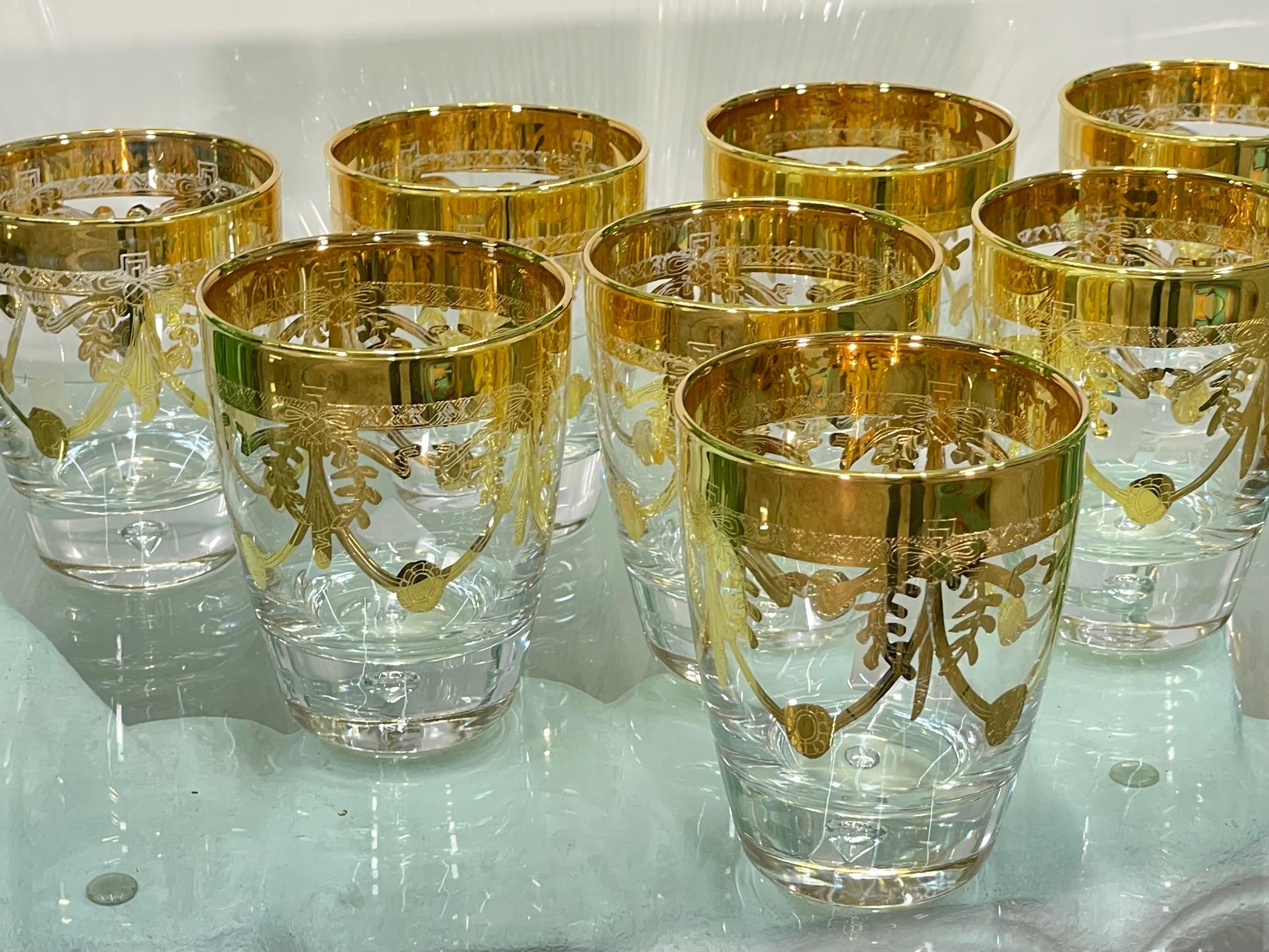 Set of 8 barware glasses by Creart feature gold leaf detailing and a heavy base with diamond shaped bubble inside. Made in Italy. In like new condition. 
For a shipping quote to your exact zip code, please message us.
