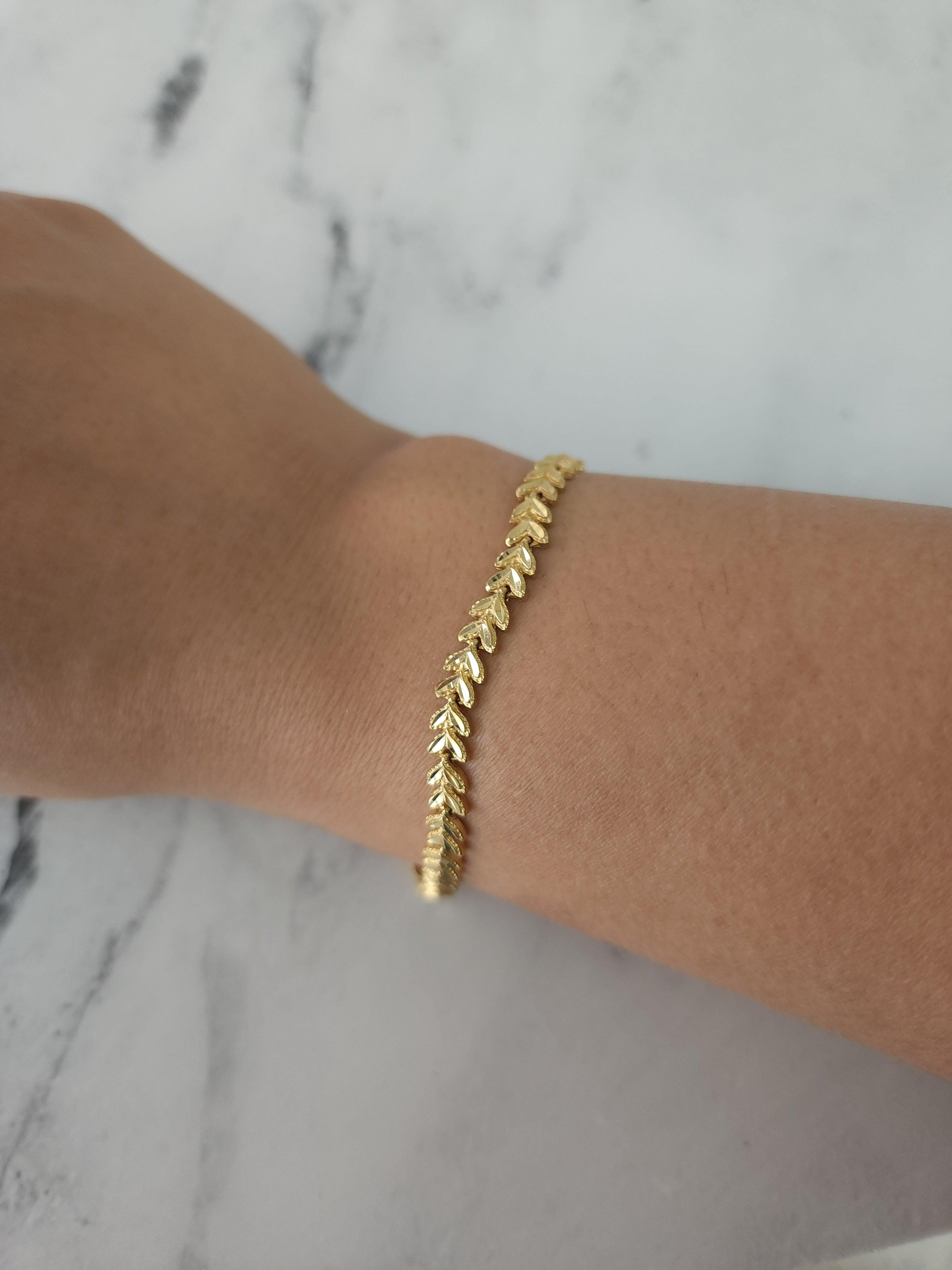 ♥ Sommaire du produit ♥

Métal : Or jaune 14k 
Poids : 8 grammes 
Longueur : 7 pouces
Largeur : 5,25 mm

Or massif, non rempli ni plaqué. 