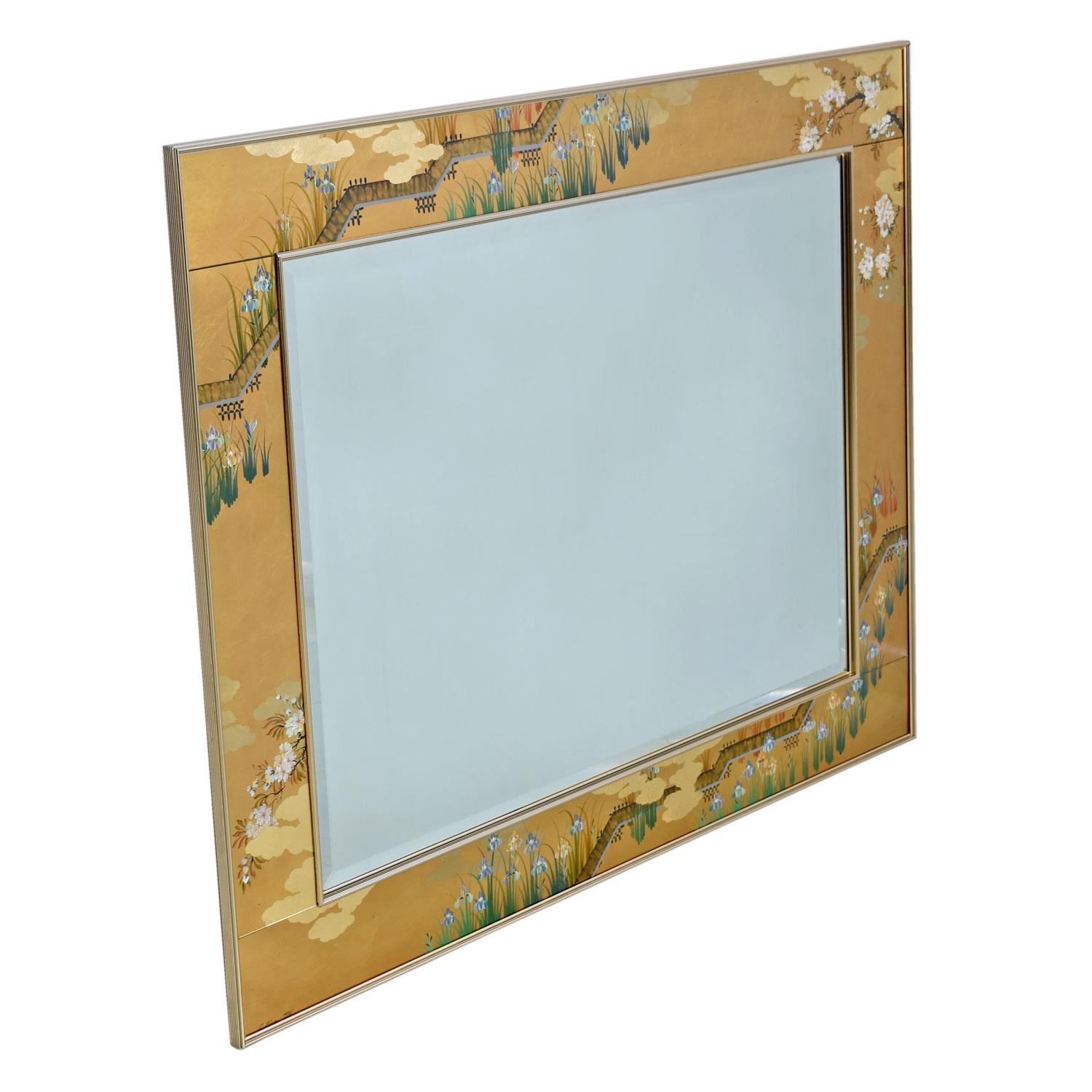 Hollywood Regency and Eastern chinoiserie styles combine to inspire the artist at Labarge who created this exquisite mirror. As if gold leaf overlay on reverse painted glass isn't glamorous enough, this beveled mirror is framed out by two brass