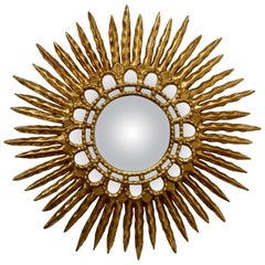 Specchio convesso in legno dorato a raggiera