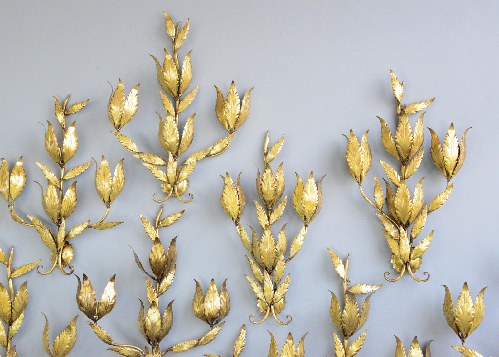Gold leaf Hollywood Regency wall lights by Hans Kögl

- Price is per light (3 available)
- Solid brass with 24ct gold leaf finish
- Take 4x E14 screw fit bulbs
- Wires directly into the wall
- Salvaged from a Casino
- By Hans Kogl
- German ~ 1960s
-