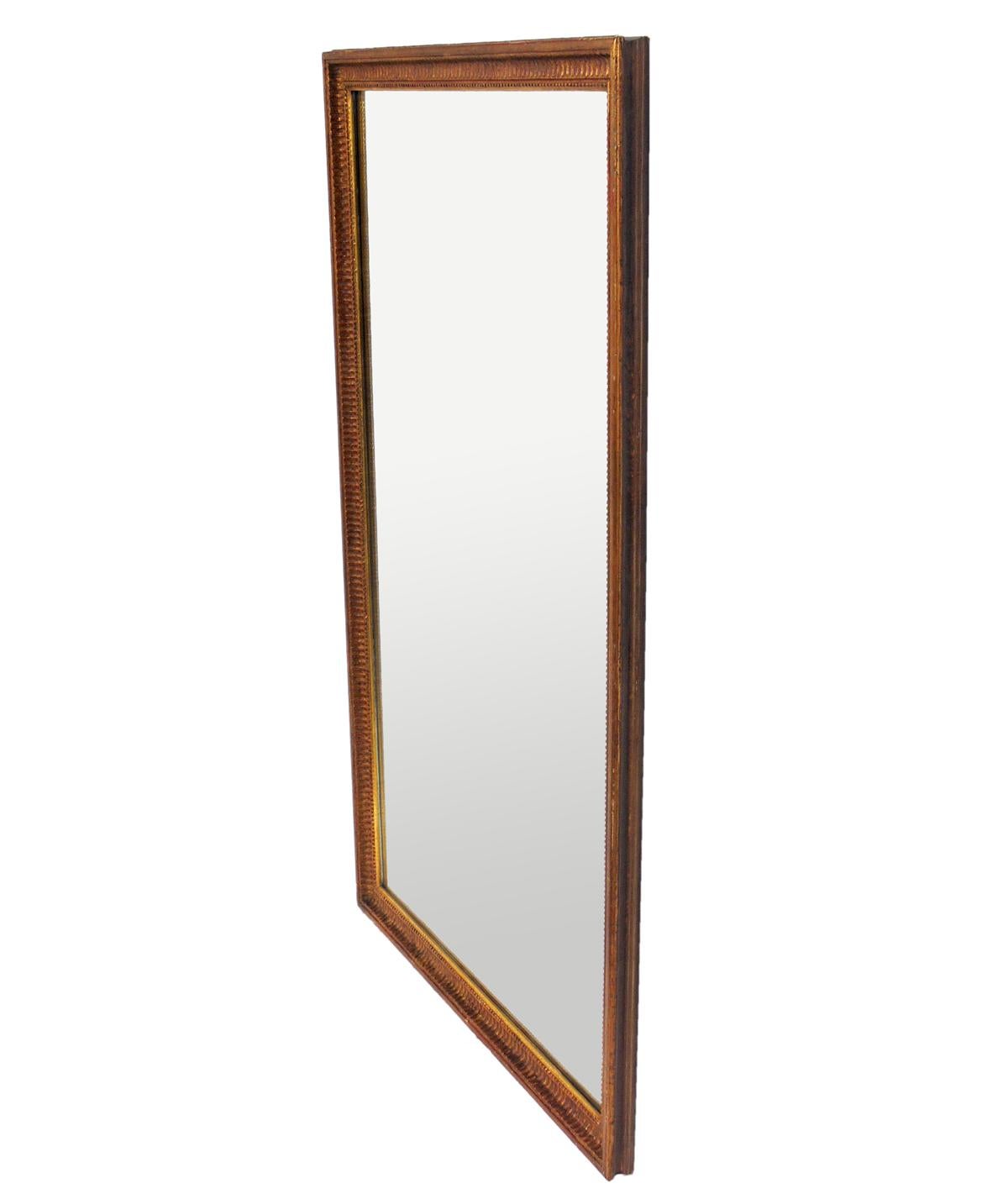 Gold Leaf Mirror, probably American, circa 1950s. Retains warm original patina to both the gilt frame and mirror that only come with age.