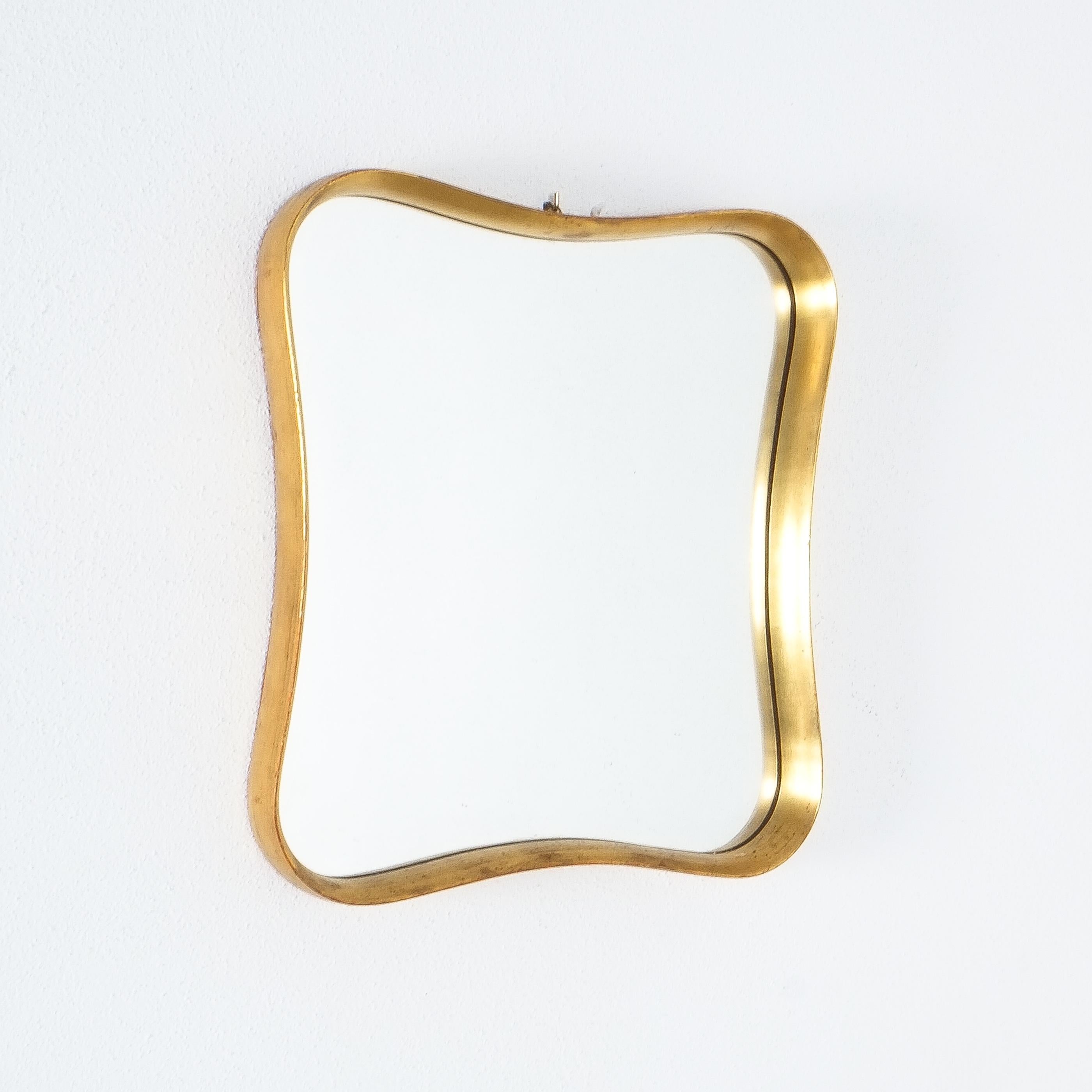Classical bent wood, gold leaf mirror, France, circa 1950-1960

French mirror with an elegant bent wood and plaster frame, plated with gold leaf. It's in good condition with normal wear to the frame and mirror glass. The gold leaf plating shows
