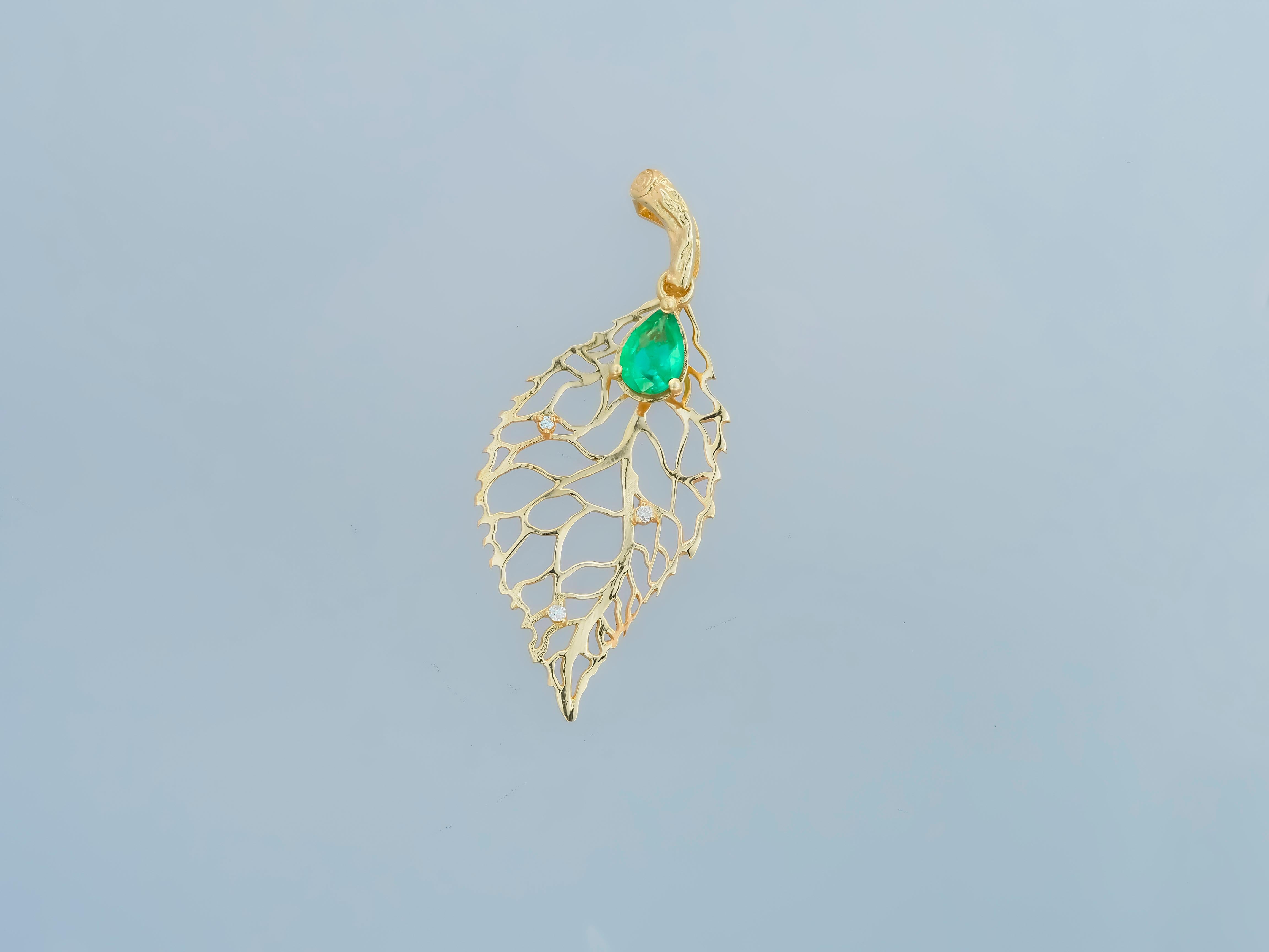 Emerald pendant. 
Gold Leaf pendant with pear Emerald. 14k gold pendant with emerald and diamonds. Teardrop Emerald Pendant. May birthstone.

Weight: 1.2 g.
Gold - 14k gold
Pendant size in mm - 37х14.86 mm.

Central stone: emerald
Cut: pear
Weight:
