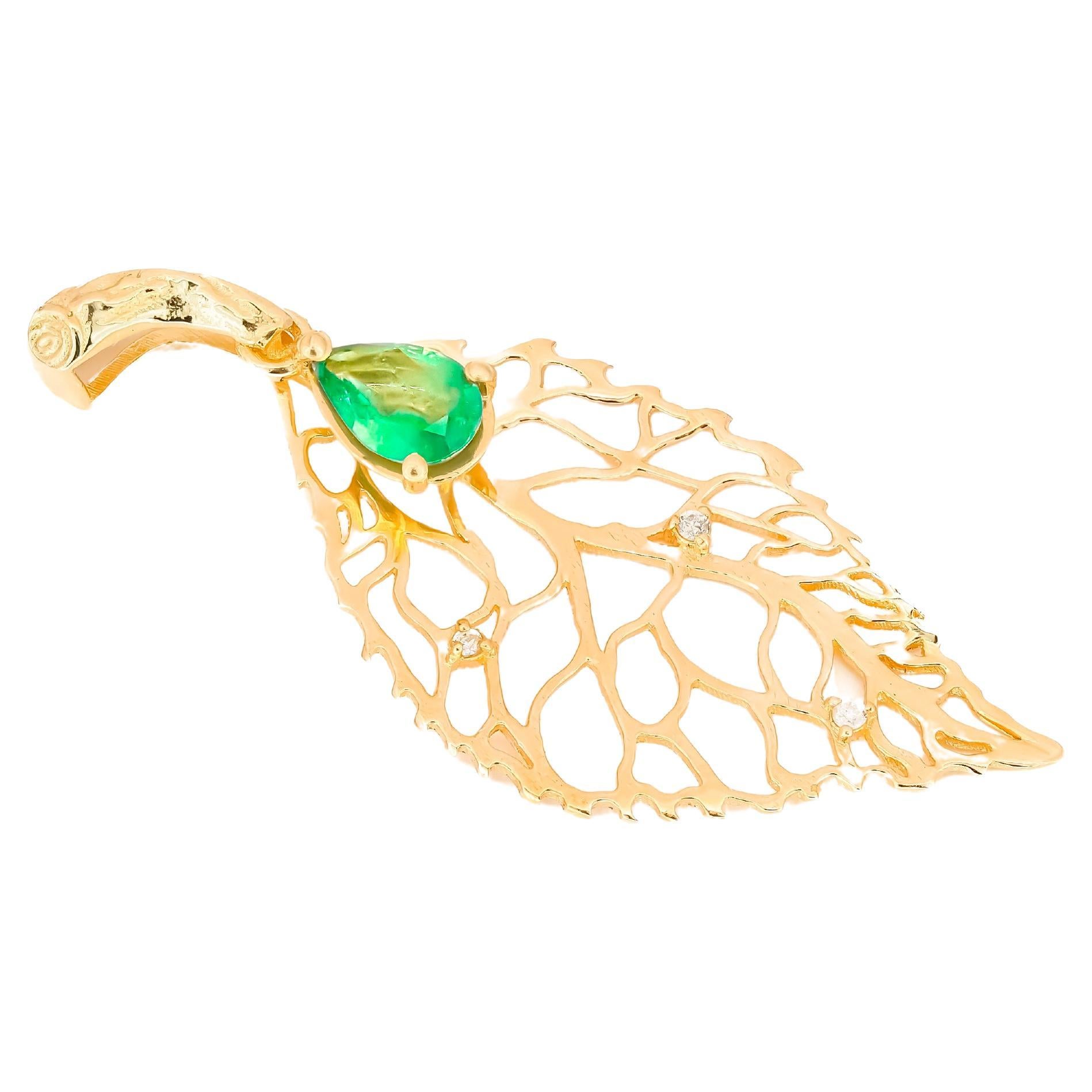 Gold Leaf pendant with pear Emerald. For Sale