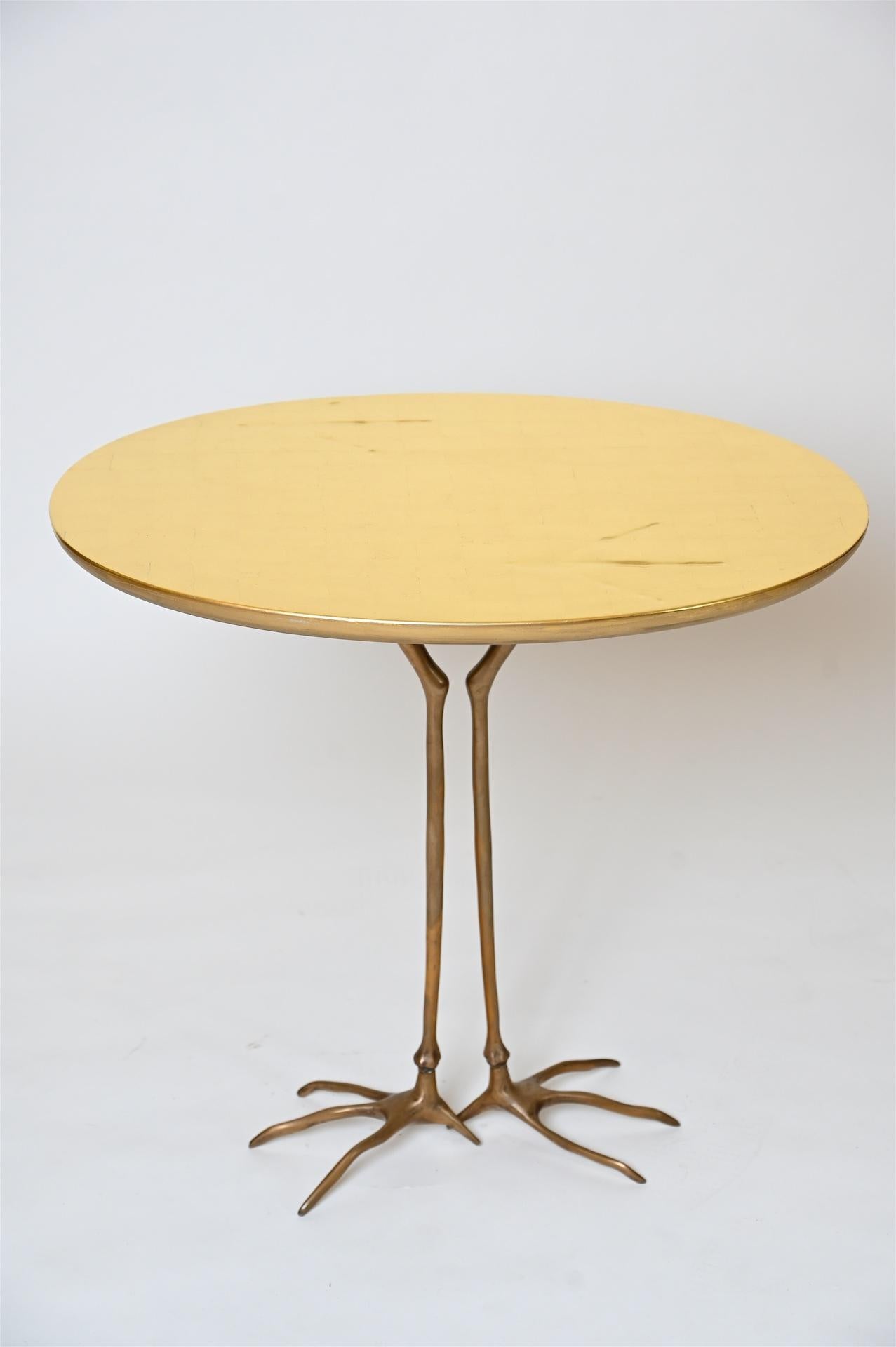 A surrealist piece of furniture designed by Meret Oppenheim in 1929. 

This table has been re-gilded in gold leaf. Also available is a glass top that has been cut to size which allows table to be used.
 