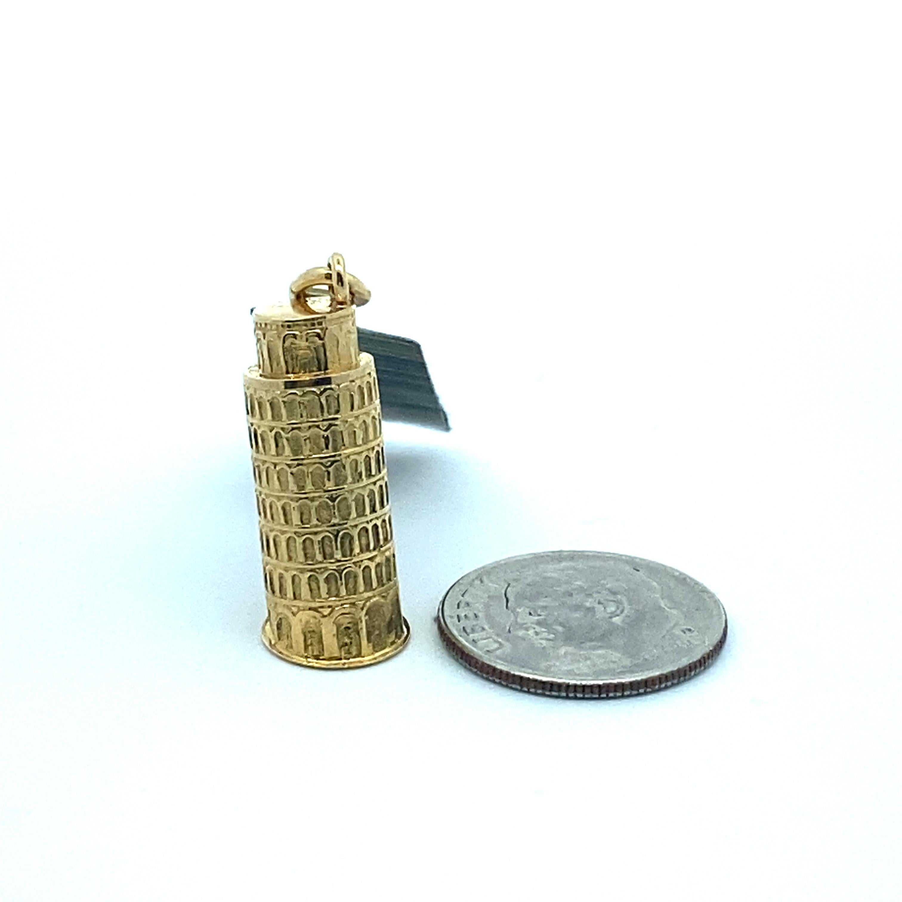 18k yellow gold Leaning Tower of Pisa charm pendant 2.9Dwt. Length 3/4 inches.